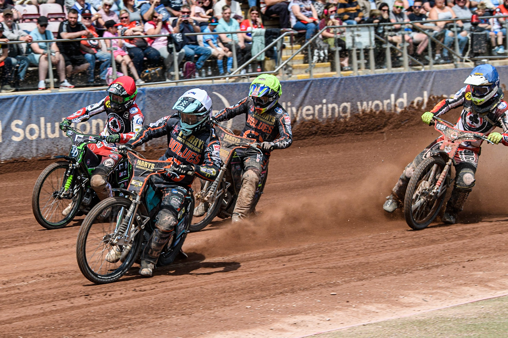 Ryan Douglas (White) leads Charles Wright (Red), Leon Flint (Yellow) and Jake Mulford (Blue) during the Sports Insure Premiership match between Belle Vue Aces and Wolverhampton Wolves at the National Speedway Stadium, Manchester on Monday 29th May 2023. (Photo: Ian Charles | MI News)