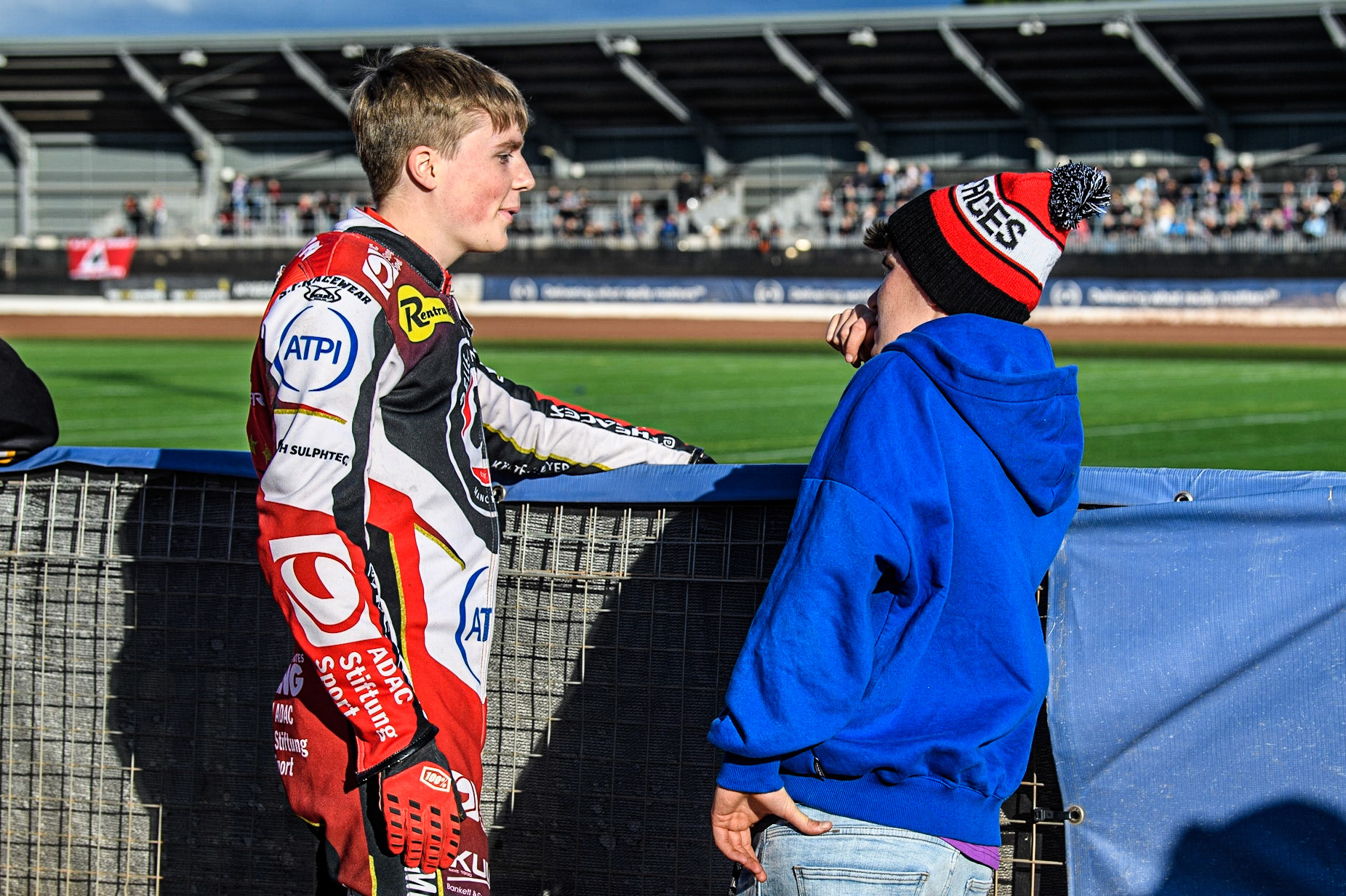 Norick Blodorn leads passes on some advice to Celina Liebmann during the Sports Insure Premiership match between Belle Vue Aces and Wolverhampton Wolves at the National Speedway Stadium, Manchester on Monday 3rd July 2023. (Photo: Ian Charles | MI News)