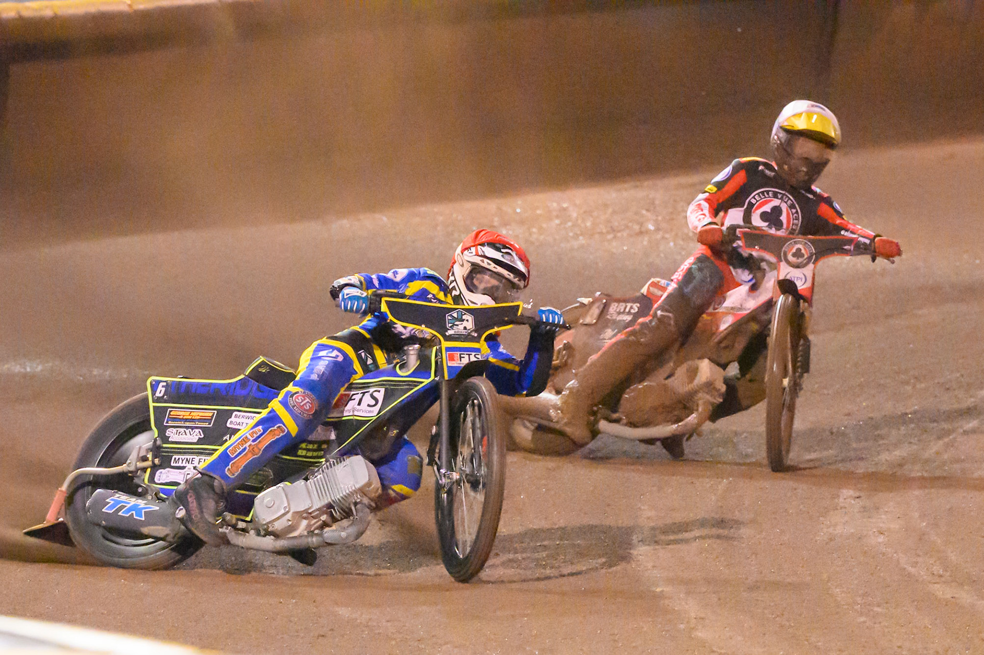 Jye Etheridge of Sheffield Tigers in Red leading Tate Zischke of Belle Vue Aces in White during the Rowe Motor Oil Premiership Grand Final 1st Leg match between Sheffield Tigers and Belle Vue Aces at Owlerton Stadium, Sheffield on Monday 12th October 2026. (Photo: Ian Charles | MI News)