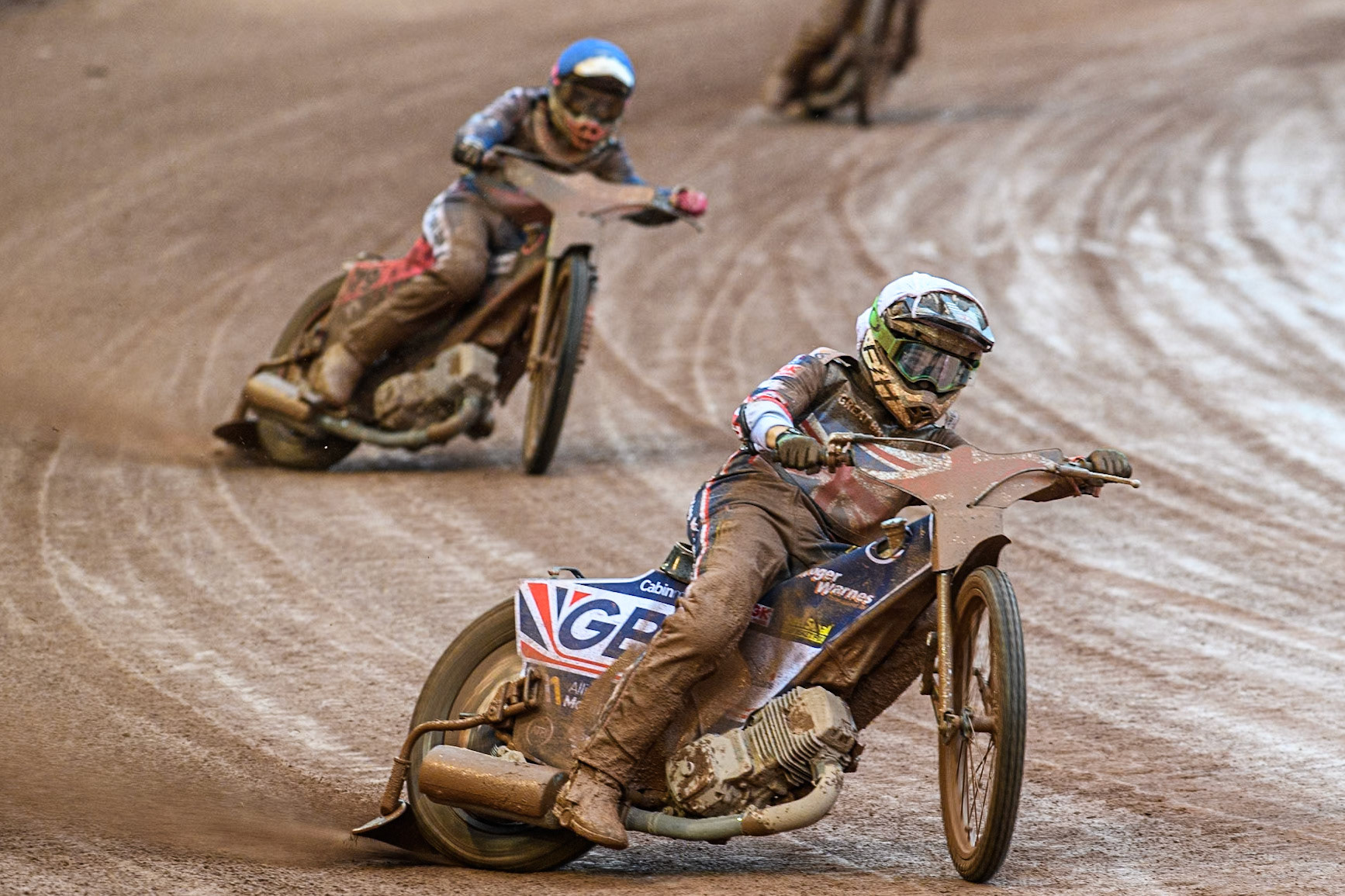 Leon Flint of Great Britain in White leading Adam Bubba Bednar of Czech Republic in White during the Monster Energy FIM Speedway of Nations 2 (Under 21) Final at the National Speedway Stadium, Manchester on Friday 12th July 2024. (Photo: Ian Charles | MI News)