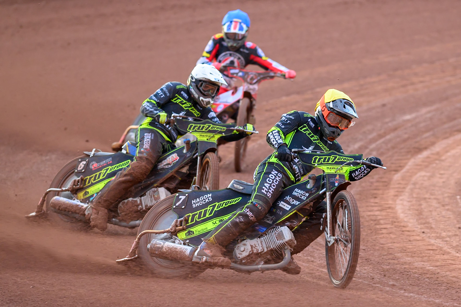 Jason Edwards of Ipswich Witches  in Yellow leading Philip Hellstrom-Bangs of Ipswich Witches  in White and Will Cairns of Belle Vue Aces  in Blue during the Rowe Motor Oil Premiership match between Belle Vue Aces and Ipswich Witches at the National Speedway Stadium, Manchester on Monday 20th April 2026. (Photo: Ian Charles | MI News)