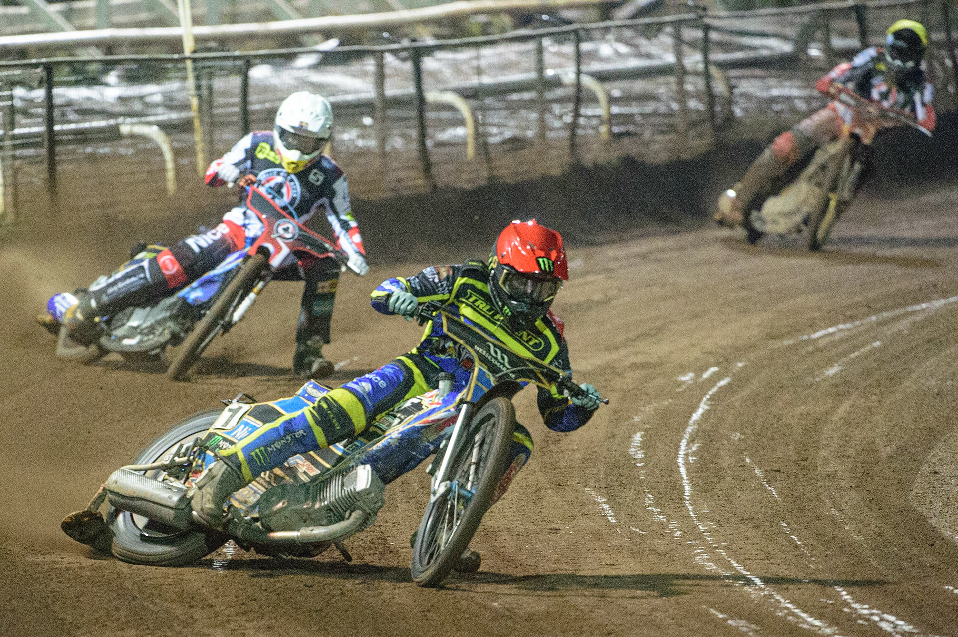 Jack Holder  (Red) leads Robert Lambert  (White) and Norick Blödorn (Yellow) during the SGB Premiership Grand Final 2nd Leg between Sheffield Tigers and Belle Vue Aces at Owlerton Stadium, Sheffield on Thursday 13th October 2022. (Credit: Ian Charles | MI News)