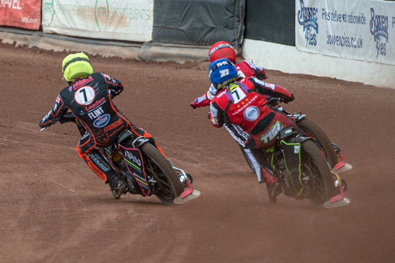 MANCHESTER, UK. JUN 13TH Leon Flint  (Yellow) inside Brady Kurtz  (Red) and Tom Brennan  (Blue) during the SGB Premiership match between Belle Vue Aces and Wolverhampton  Wolves at the National Speedway Stadium, Manchester on Monday 13th June 2022. (Credit: Ian Charles | MI News)