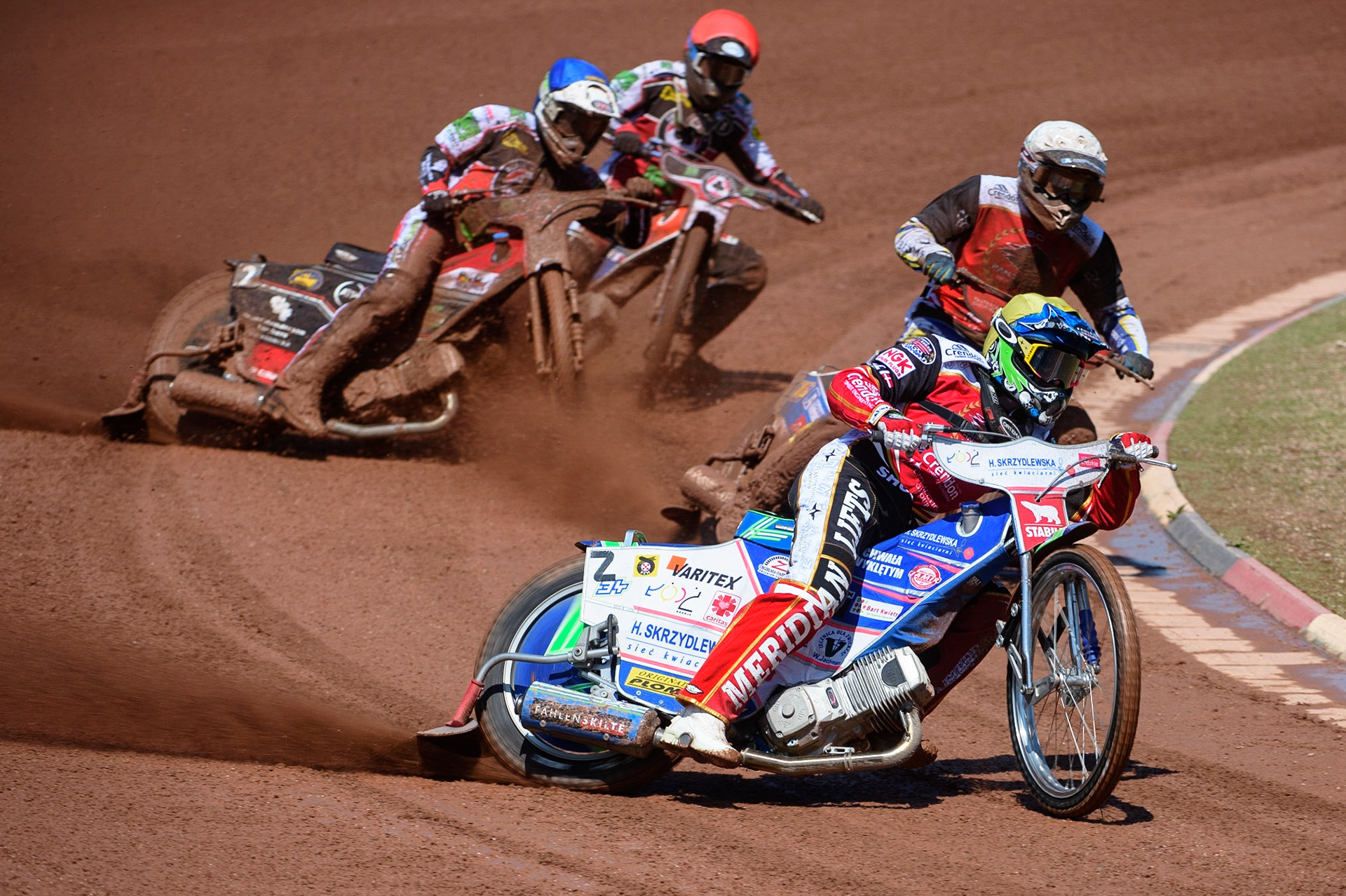 MANCHESTER, UK. MAY 31ST  Hans Andersen  (Yellow) leads Bjarne Pedersen  (White), Richie Worrall  (Blue) and Brady Kurtz  (Red) during the SGB Premiership match between Belle Vue Aces and Peterborough at the National Speedway Stadium, Manchester on Monday 31st May 2021. (Credit: Ian Charles | MI News)