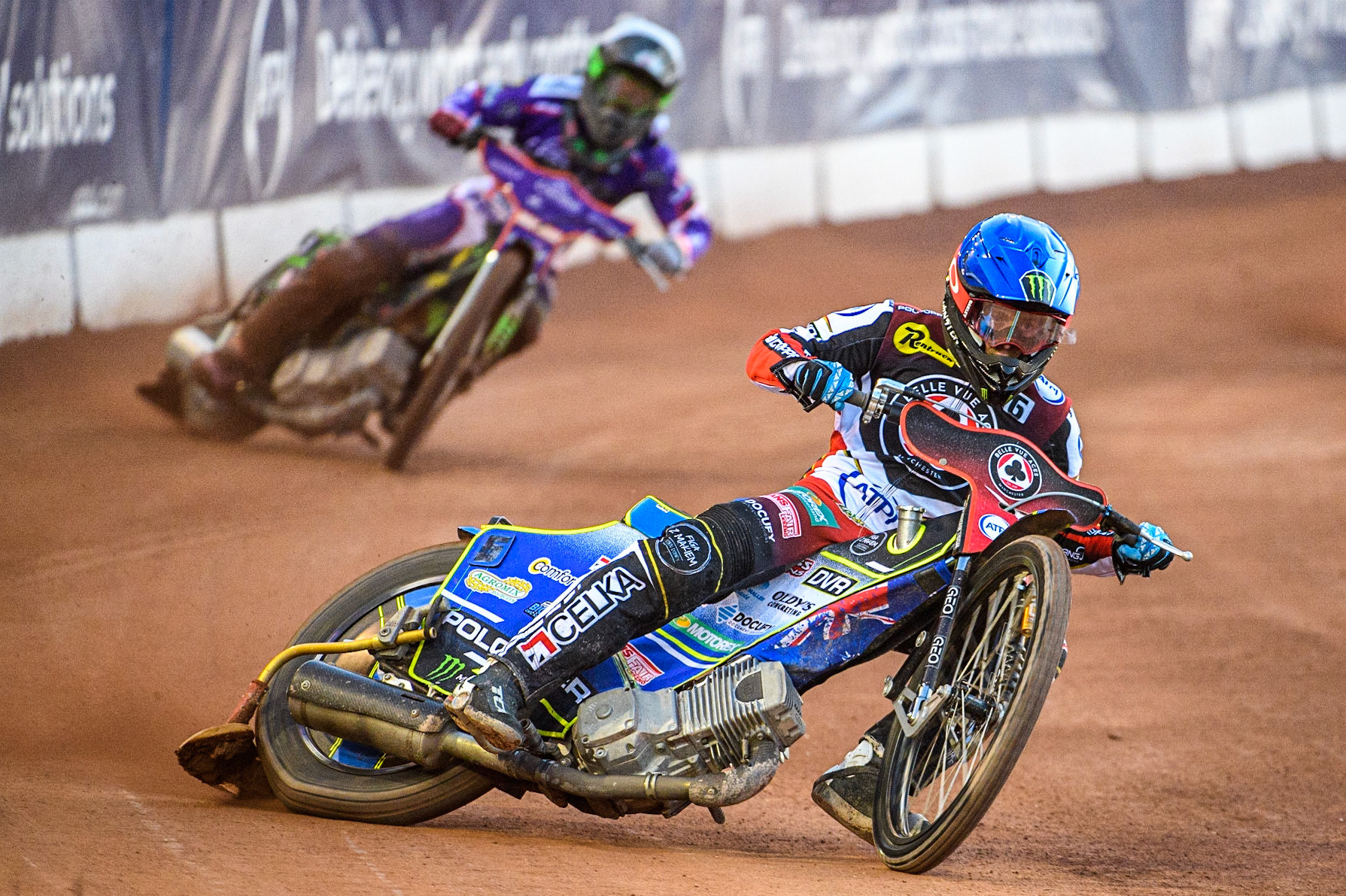 Jaimon Lidsey  (Blue) leads Benjamin Basso  (White) during the SGB Premiership match between Belle Vue Aces and Peterborough at the National Speedway Stadium, Manchester on Monday 24th April 2023. (Photo: Ian Charles | MI News)