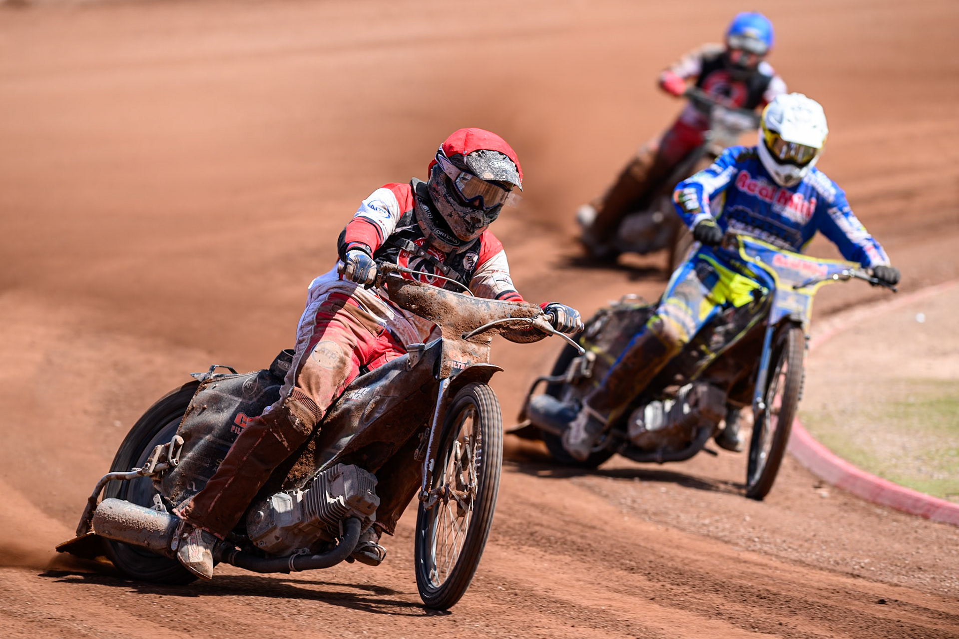 Belle Vue Colts' Jack Kingston  in Red leading Oxford Chargers' Jody Scott  in White and Belle Vue Colts' Mason Watson  in Blue during the WSRA National Development League match between Belle Vue Colts and Oxford Chargers at the National Speedway Stadium, Manchester on Sunday 1st June 2025. (Photo: Ian Charles | MI News)