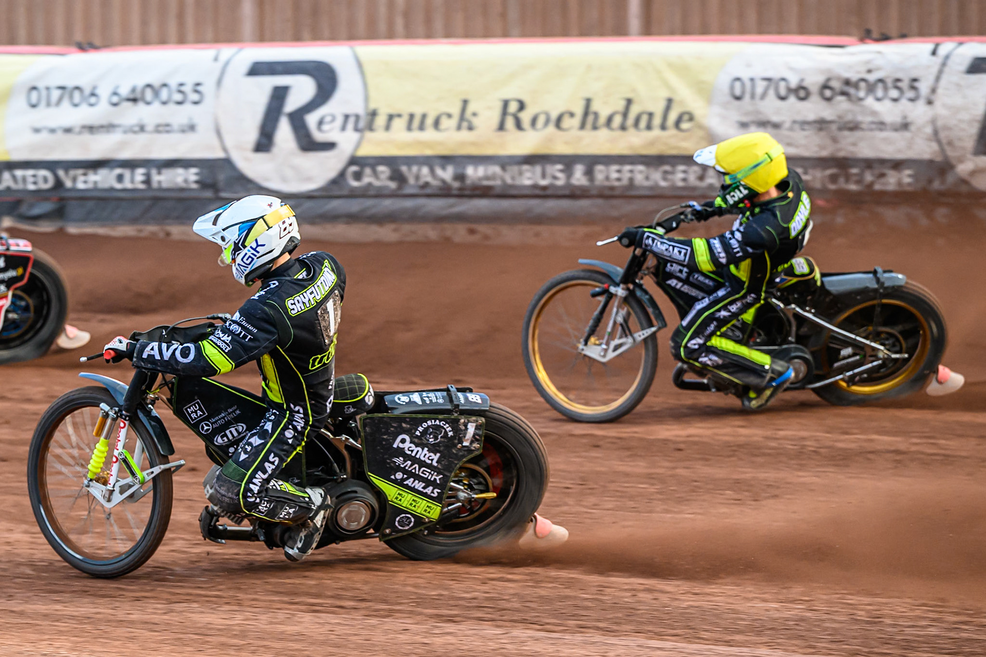 Ipswich Witches' Emil Saifutdinov in White on the inside of Ipswich Witches' Jason Doyle  in Yellow during the Rowe Motor Oil Premiership match between Belle Vue Aces and Ipswich Witches at the National Speedway Stadium, Manchester on Monday 30th June 2025. (Photo: Ian Charles | MI News)