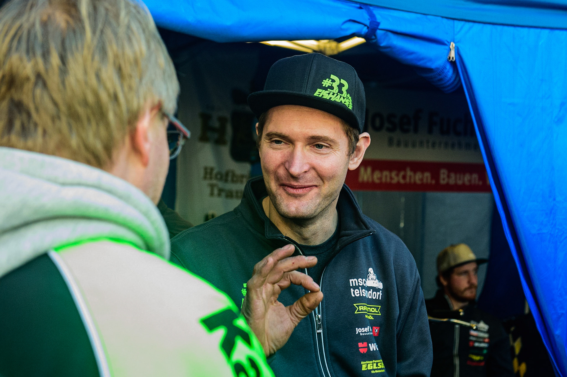 Johann Weber (16) chats with a fan during the Ice Speedway Gladiators World Championship Final 1 at Max-Aicher-Arena, Inzell, Germany on Saturday 18th March 2023. (Photo: Ian Charles | MI News)