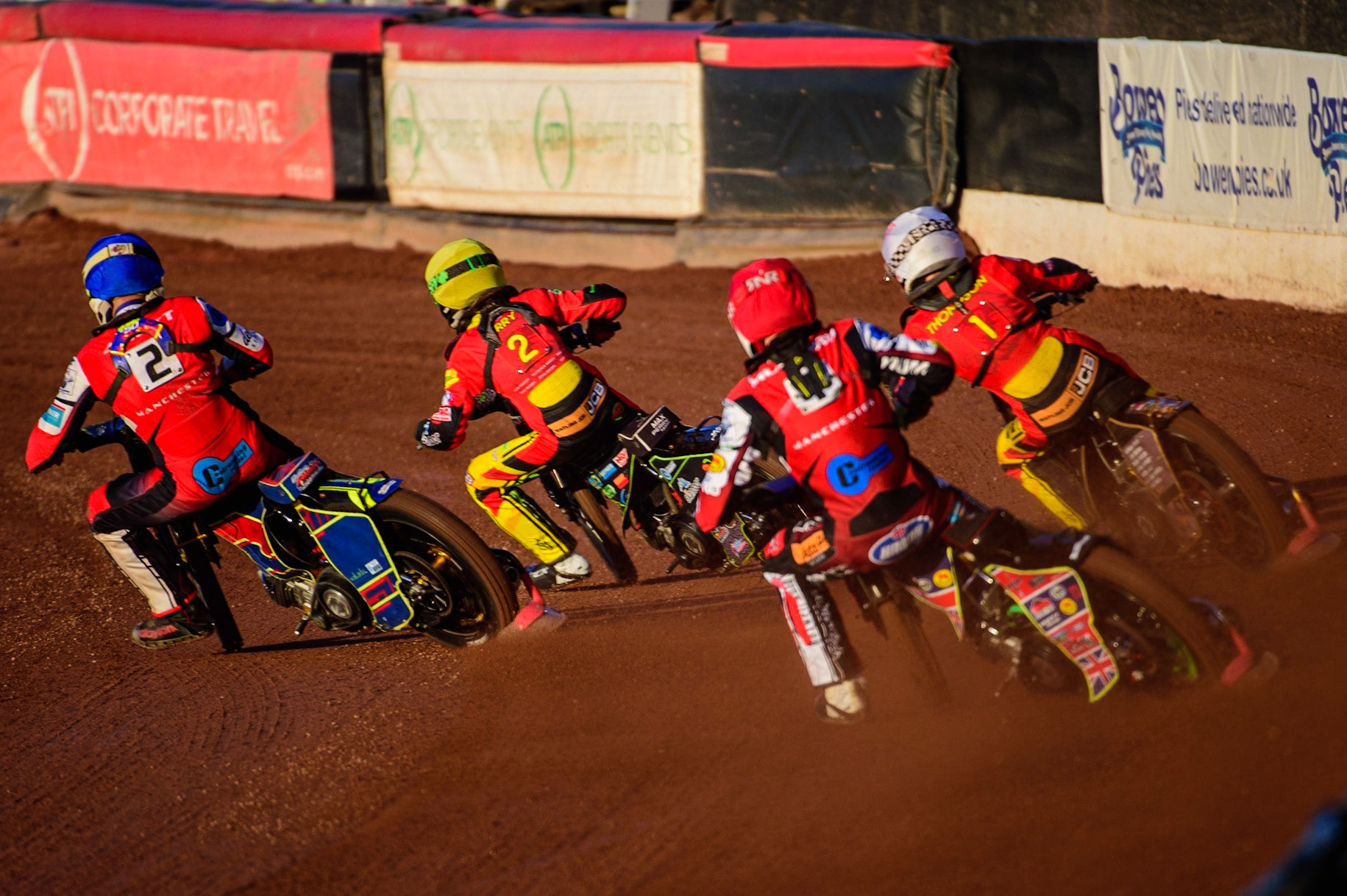 Jake Mulford  (Red) chases Nathan Ablitt  (Blue), Dan Thompson   (White) and Max Perry   (Yellow) during the National Development League match between Belle Vue Aces and Leicester Lions at the National Speedway Stadium, Manchester on Friday 19th August 2022. (Credit: Ian Charles | MI News)