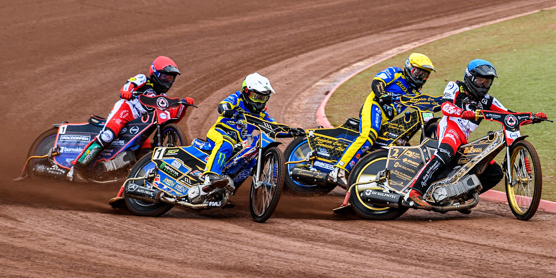 Belle Vue ATPI Aces Norick Blodorn (Blue) leads  Sheffield Tigers' Kyle Howarth (Yellow), Sheffield Tigers' Jack Holder (White) and Belle Vue ATPI Aces Brady Kurtz (Red) during the Rowe Motor Oil Premiership KO Cup Quarter Final 1st Leg between Belle Vue Aces and Sheffield Tigers at the National Speedway Stadium, Manchester on Monday 1st April 2024. (Photo: Ian Charles | MI News)