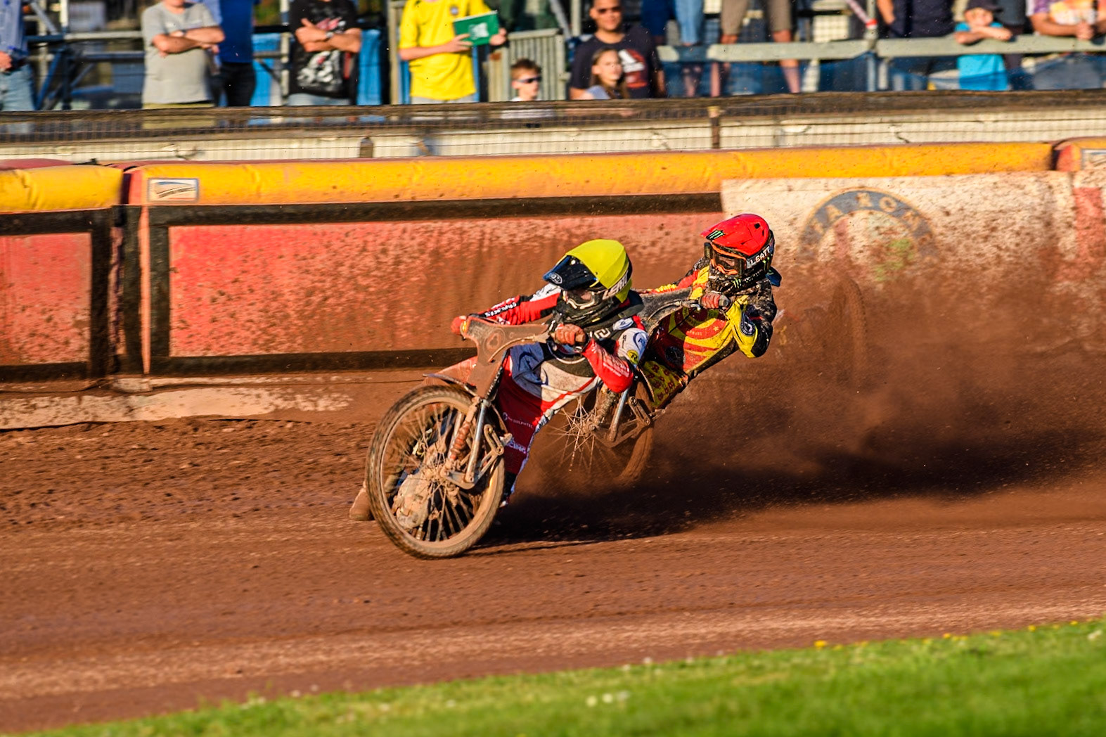 Belle Vue Aces' Brady Kurtz falls again in the rerun of Heat 1 on the first turn behind Belle Vue Aces' Norick Blodorn in Yellow and Birmingham Brummies' Freddie Lindgren in Red during the Rowe Motor Oil Premiership match between Birmingham Brummies and Belle Vue Aces at Perry Bar Stadium, Birmingham on Monday 29th July 2024. (Photo: Ian Charles | MI News)