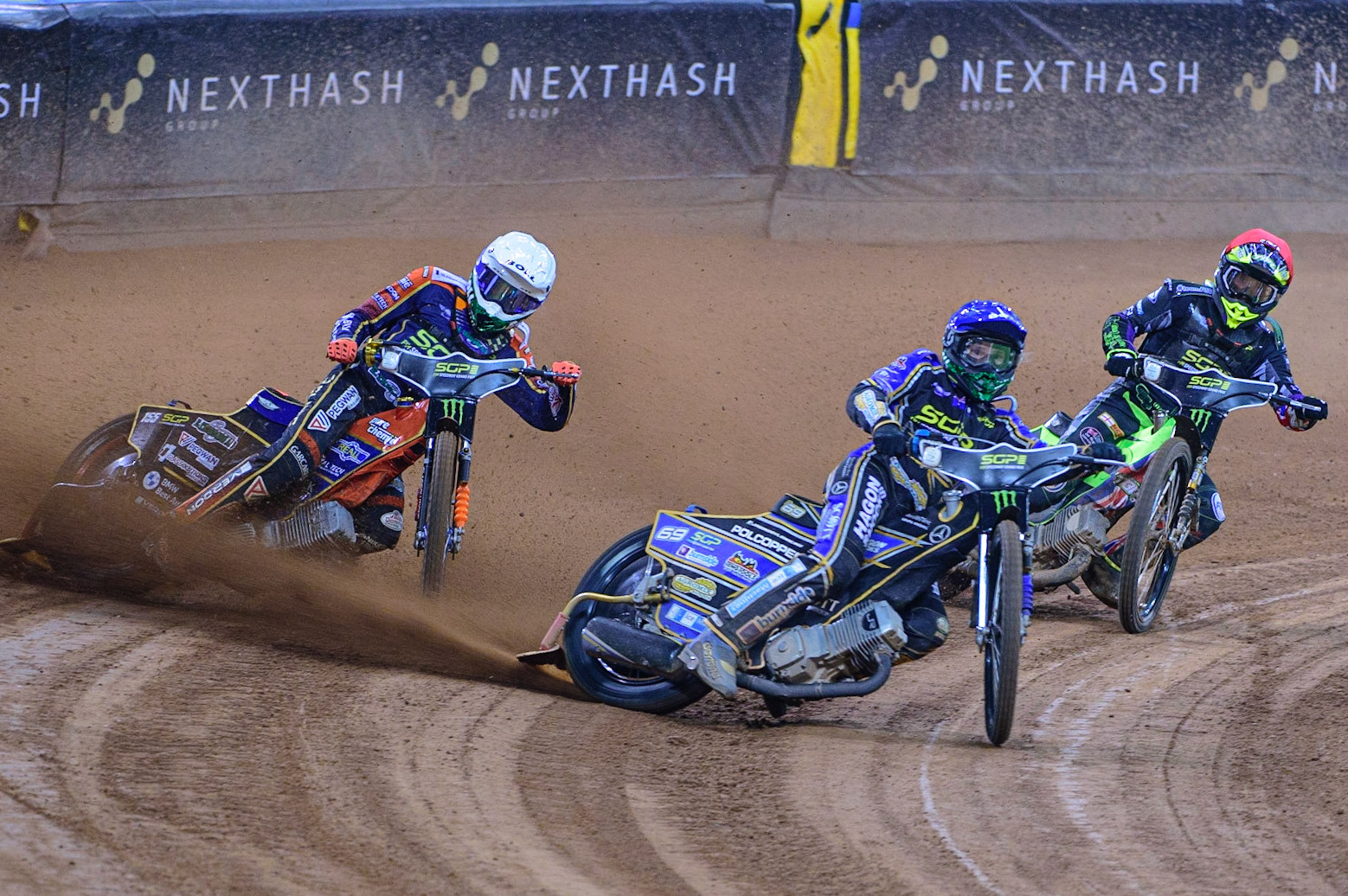 Jason Doyle (69) (Blue) leads Mikkel Michelsen (155) (White) and Tom Brennan (17) (Red) during the FIM  Speedway Grand Prix of Great Britain at the Principality Stadium, Cardiff on Saturday 13th August 2022. (Credit: Ian Charles | MI News