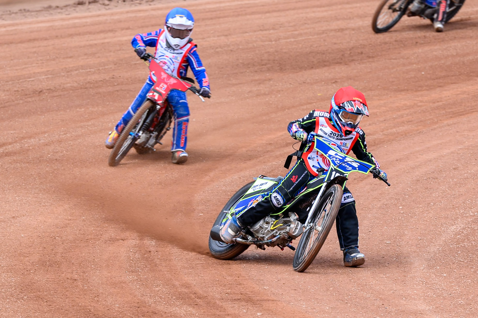 125cc SUPPORT CLASS Cody Smith (162) in Red leading Aston Knott (89) in Blue during the British Youth Championship (125cc) at the National Speedway Stadium, Manchester on Sunday 19th July 2026. (Photo: Ian Charles | MI News)