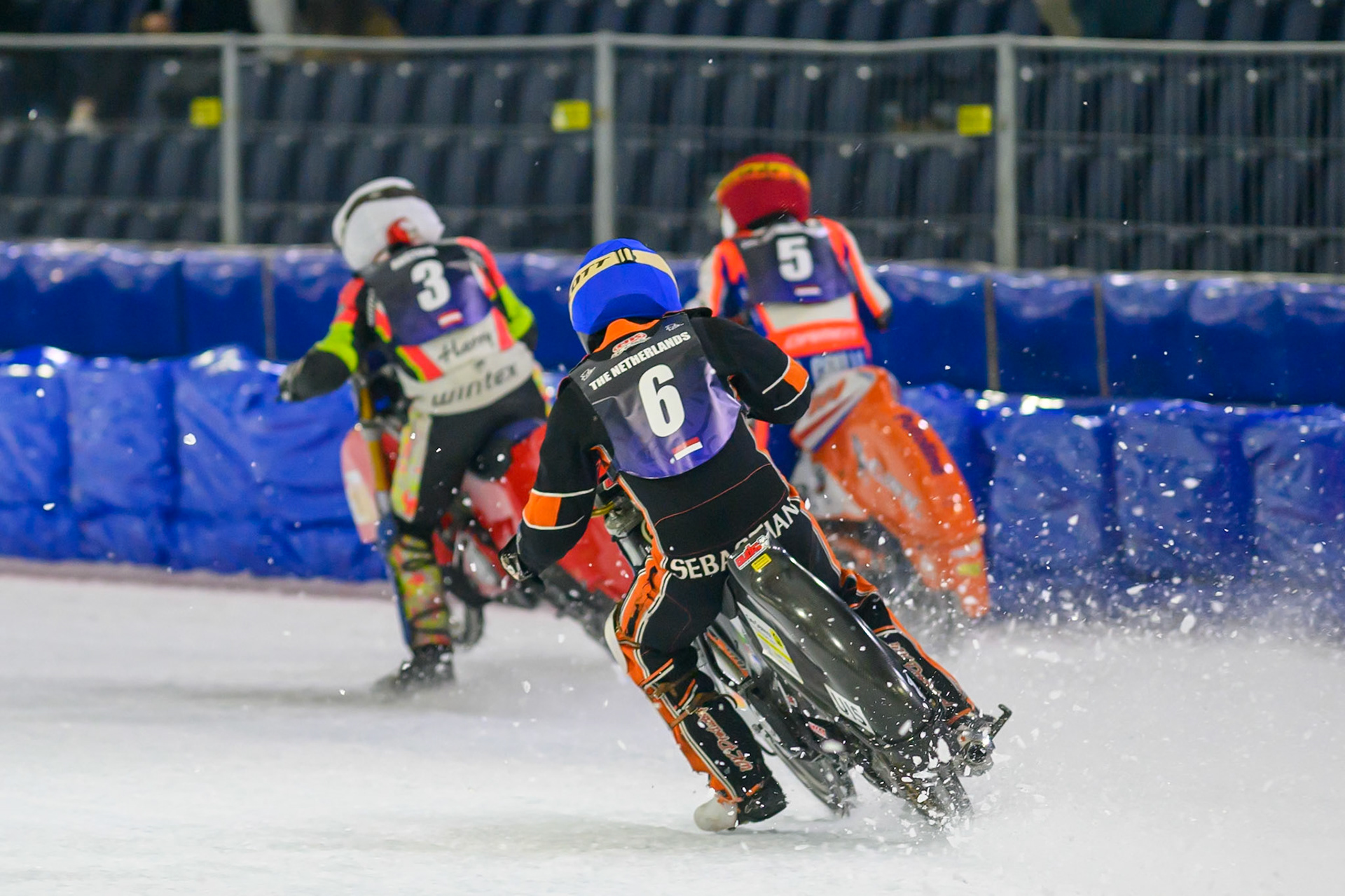 Heat 12 re-run: Sebastian Reitsma (6) of The Netherlands  in Blue chases Jasper Iwema (5) of The Netherlands  in Red and Harald Simon (3) of Austria   in White during the FIM Ice Speedway Of Nations at Ice Rink Thialf, Heerenveen on Sunday 12th April 2026. (Photo: Ian Charles | MI News)