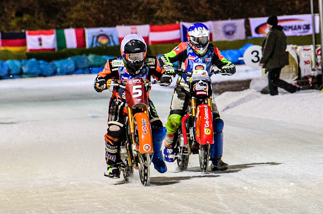 In the last chance race, Lukas Hutla (White) outside Harald Simon (Blue) during the German Individual Ice Speedway Championship at Horst-Dohm-Eisstadion, Berlin on Friday 3rd March 2023. (Photo: Ian Charles | MI News)
