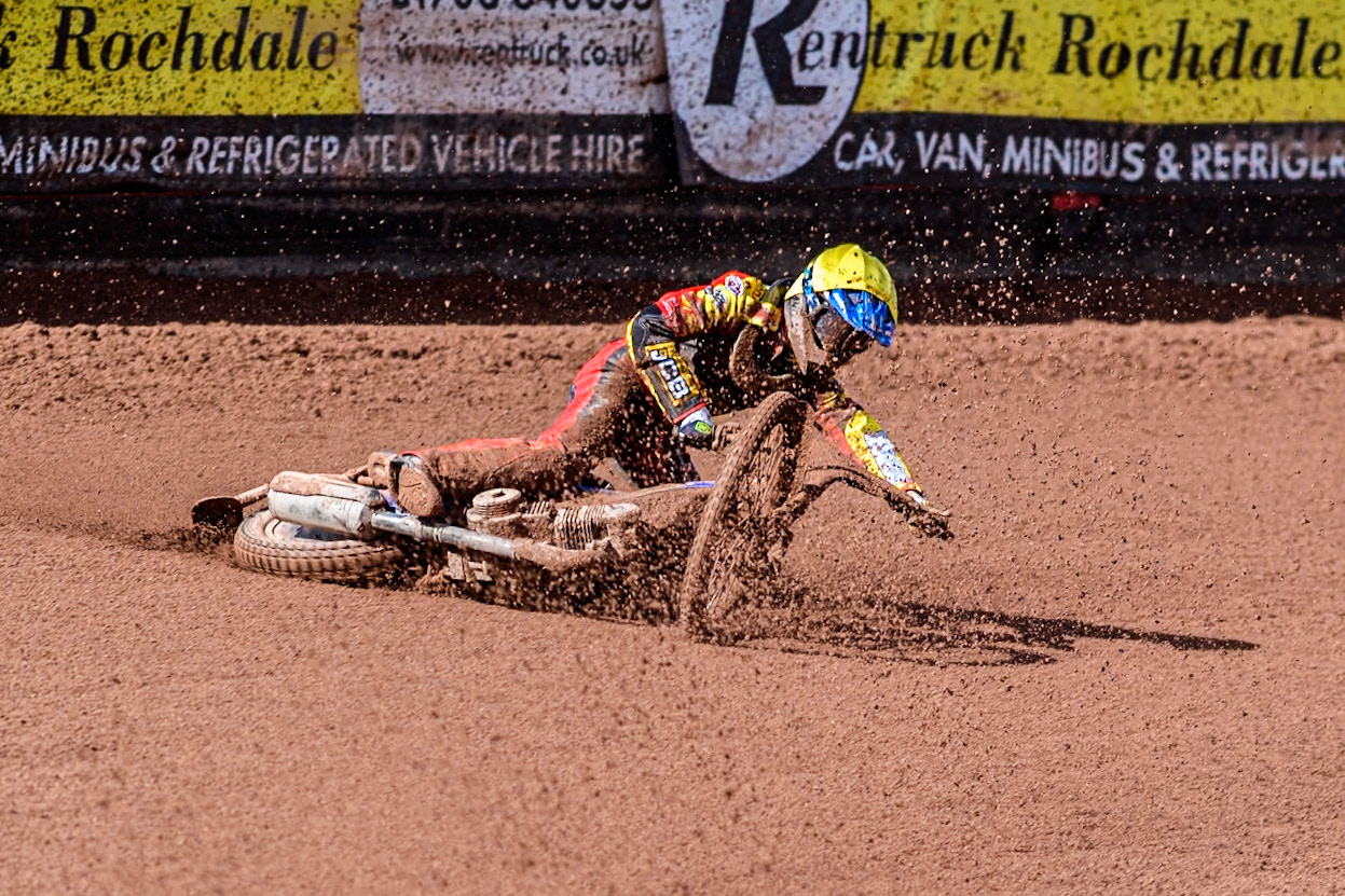 Leicester Lion Cubs' Sonny Springer  (Yellow) falls behind team mate Leicester Lion Cubs' Luke Crang (White) during the WSRA  National Development League match between Belle Vue Colts and Leicester Lion Cubs at the National Speedway Stadium, Manchester on Friday 29th March 2024. (Photo: Ian Charles | MI News)