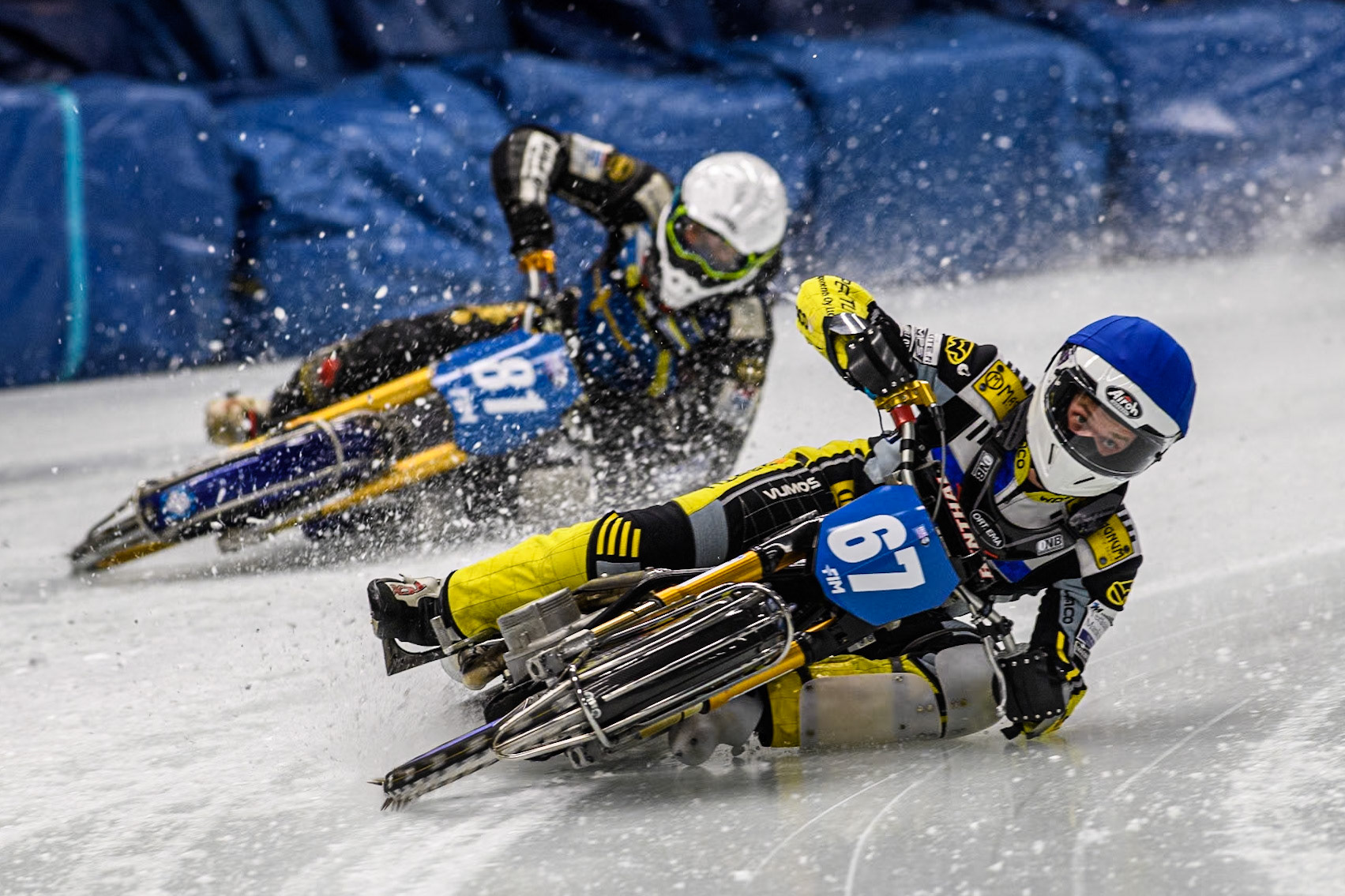 Finland's Heikki Huusko (67) (Blue) leads  Sweden"s Jimmy Olsén (81) (White) during the FIM Ice Speedway Gladiators World Championship Final 1 at the Max-Aicher-Arena, Inzell on Saturday 23 March 2024. (Photo: Ian Charles | MI News)