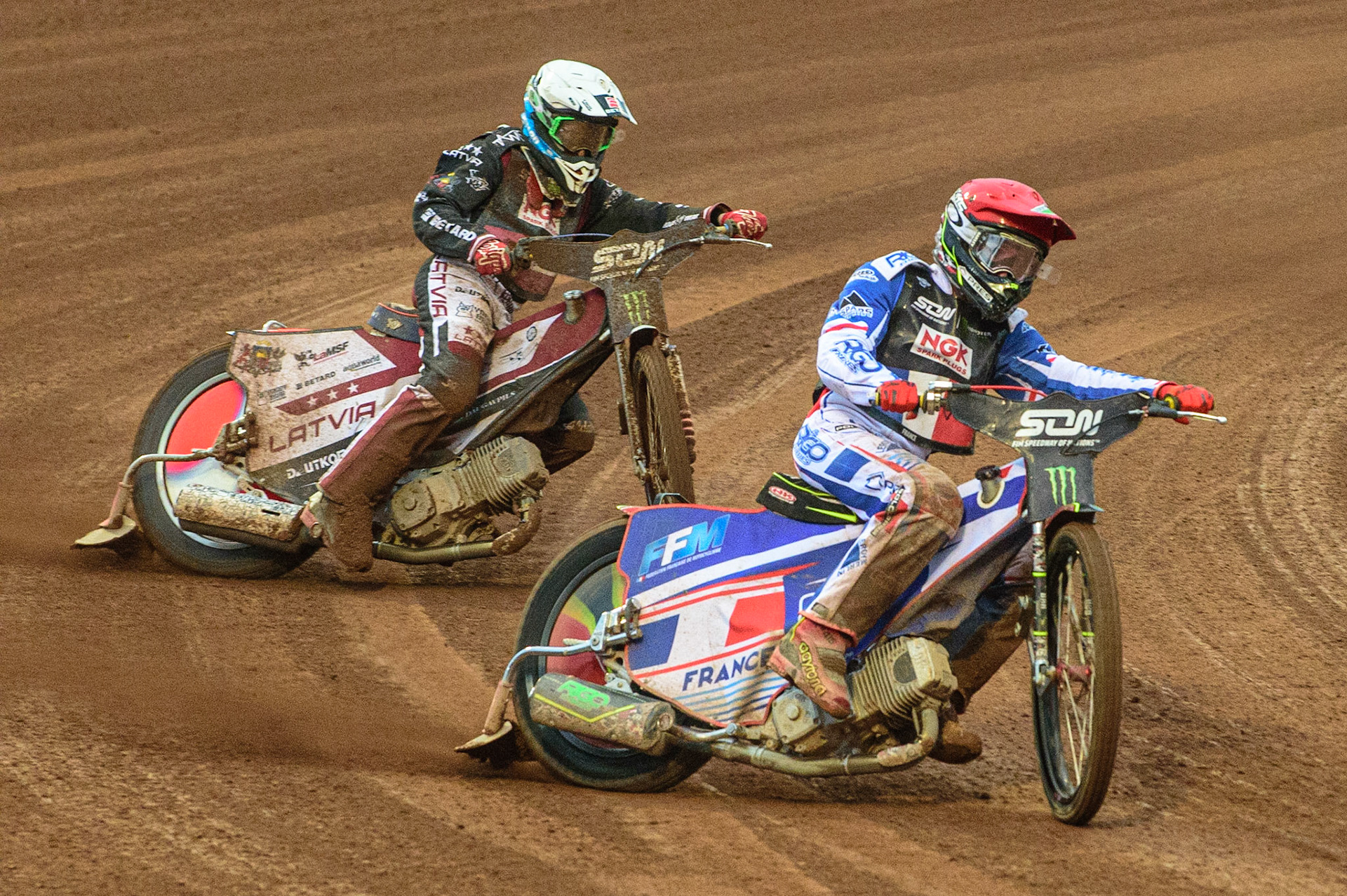 MANCHESTER, UK. OCT 17TH David Bellego of France leads Andzejs Lebedevs of Latvia (Red) during the Monster Energy FIM Speedway of Nations at the National Speedway Stadium, Manchester on Sunday  17th October 2021. (Credit: Ian Charles | MI News)