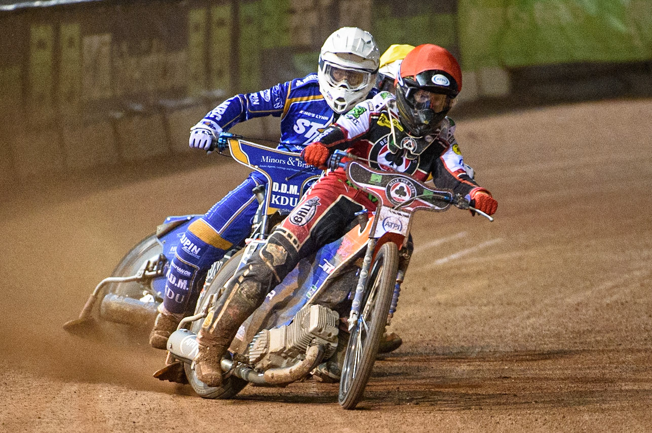 MANCHESTER, UK. SEPT 13TH  Brady Kurtz  (Red) leads Erik Riss  (White) and Lewis Kerr  (Yellow) during the SGB Premiership match between Belle Vue Aces and King's Lynn Stars at the National Speedway Stadium, Manchester on Monday 13th September 2021. (Credit: Ian Charles | MI News)