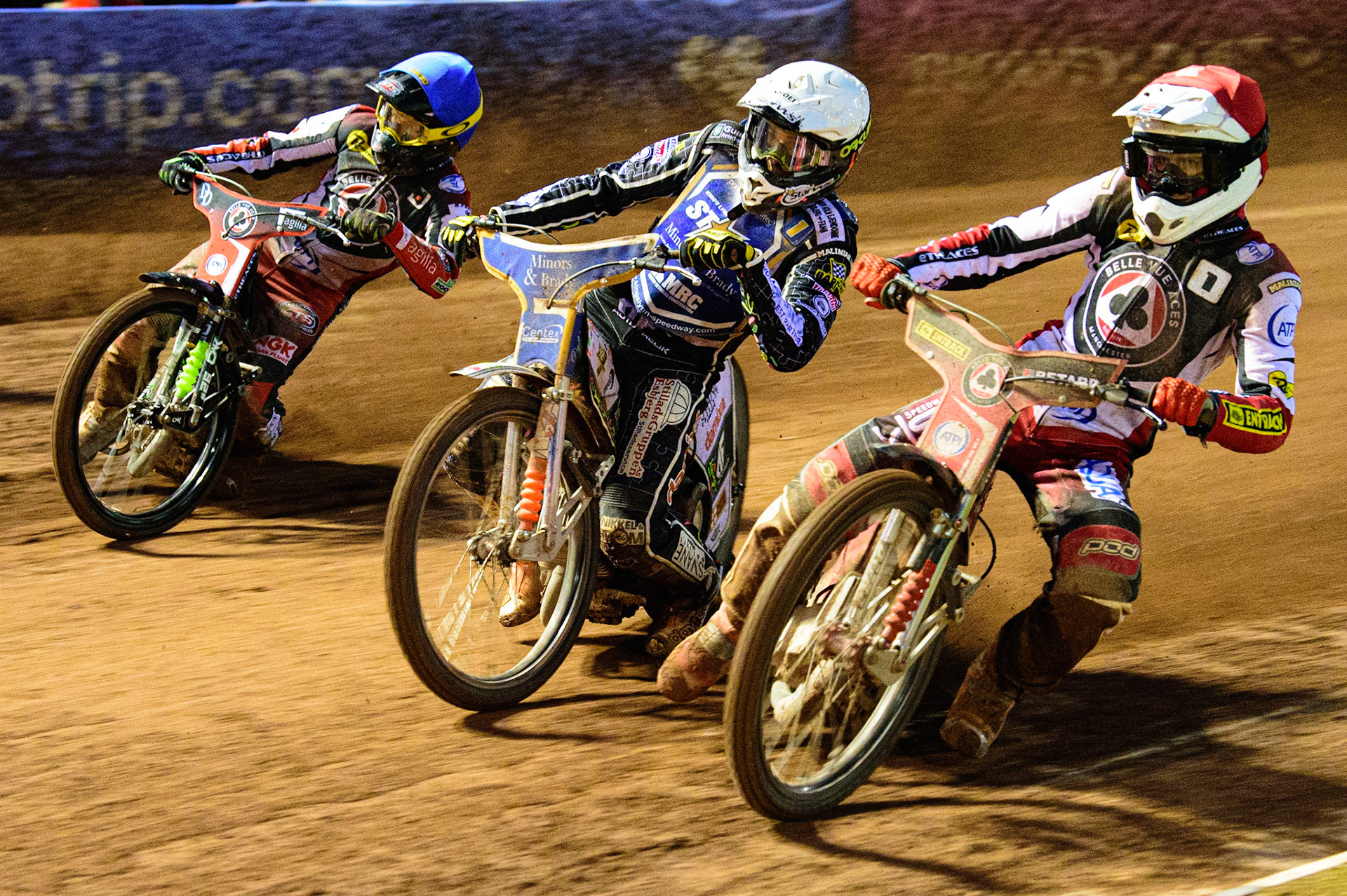 MANCHESTER, UK. MAY 16TH Max Fricke  (Red) inside Niels-Kristian Iversen  (White) and Charles Wright  (Blue) during the SGB Premiership match between Belle Vue Aces and King's Lynn Stars at the National Speedway Stadium, Manchester on Monday 16th May 2022. (Credit: Ian Charles | MI News)