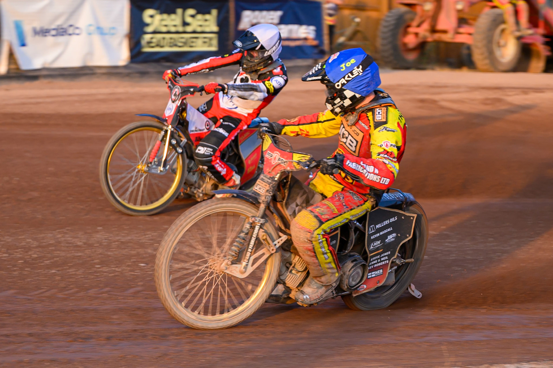 Joe Thompson of Leicester Lions in Blue rides inside Norick Blodorn of Belle Vue Aces  in White during the Rowe Motor Oil Premiership match between Leicester Lions and Belle Vue Aces at the Hydroscan Arena, Leicester on Thursday 23rd July 2026. (Photo: Ian Charles | MI News)