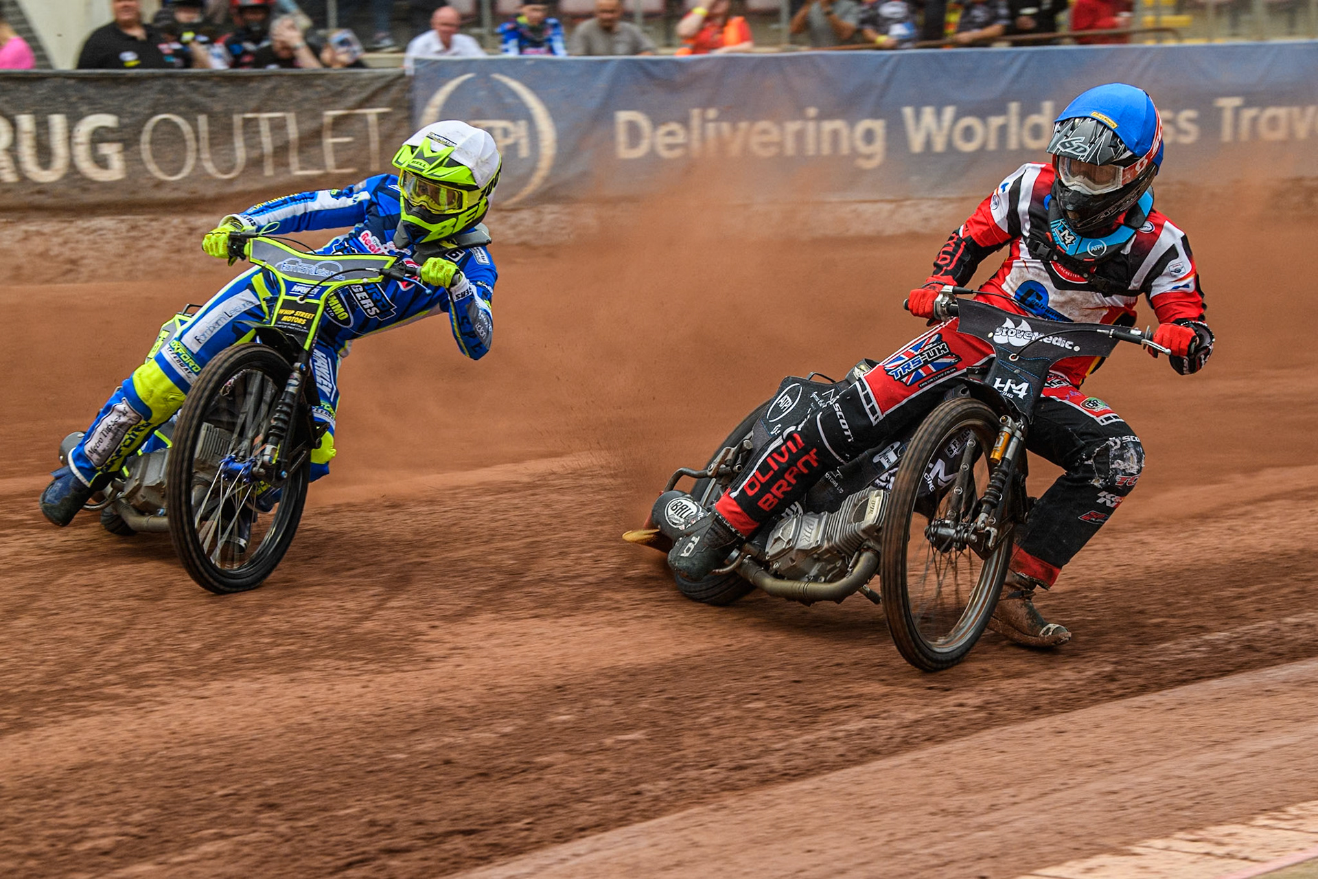 Belle Vue Colts' Harry McGurk  in Blue rides inside Oxford Chargers' Jacob Clouting  in White during the WSRA National Development League match between Belle Vue Colts and Oxford Chargers at the National Speedway Stadium, Manchester on Friday 2nd August 2024. (Photo: Ian Charles | MI News)