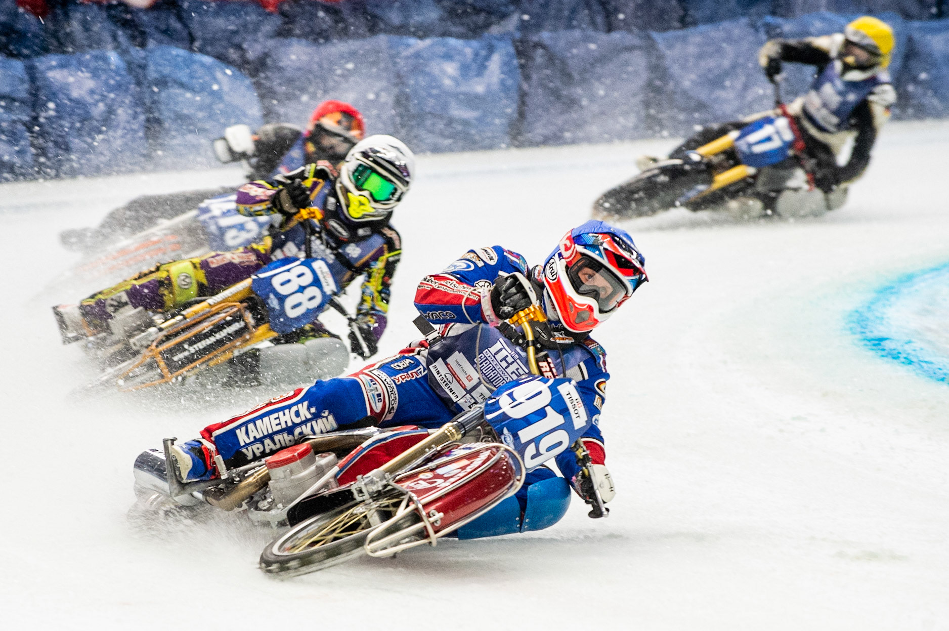Photo: Ian Charles

Dmitri Khomitsevich (919) leads Max Niedermaier (88) (White) Jimmy Tuinstra (273) and  Franz Mayerbüchler (17)

FIM Ice Speedway Gladiators World Championship, Event 4.1, Max-Aicher-Arena, Inzell, Germany, Saturday 16 March 2019