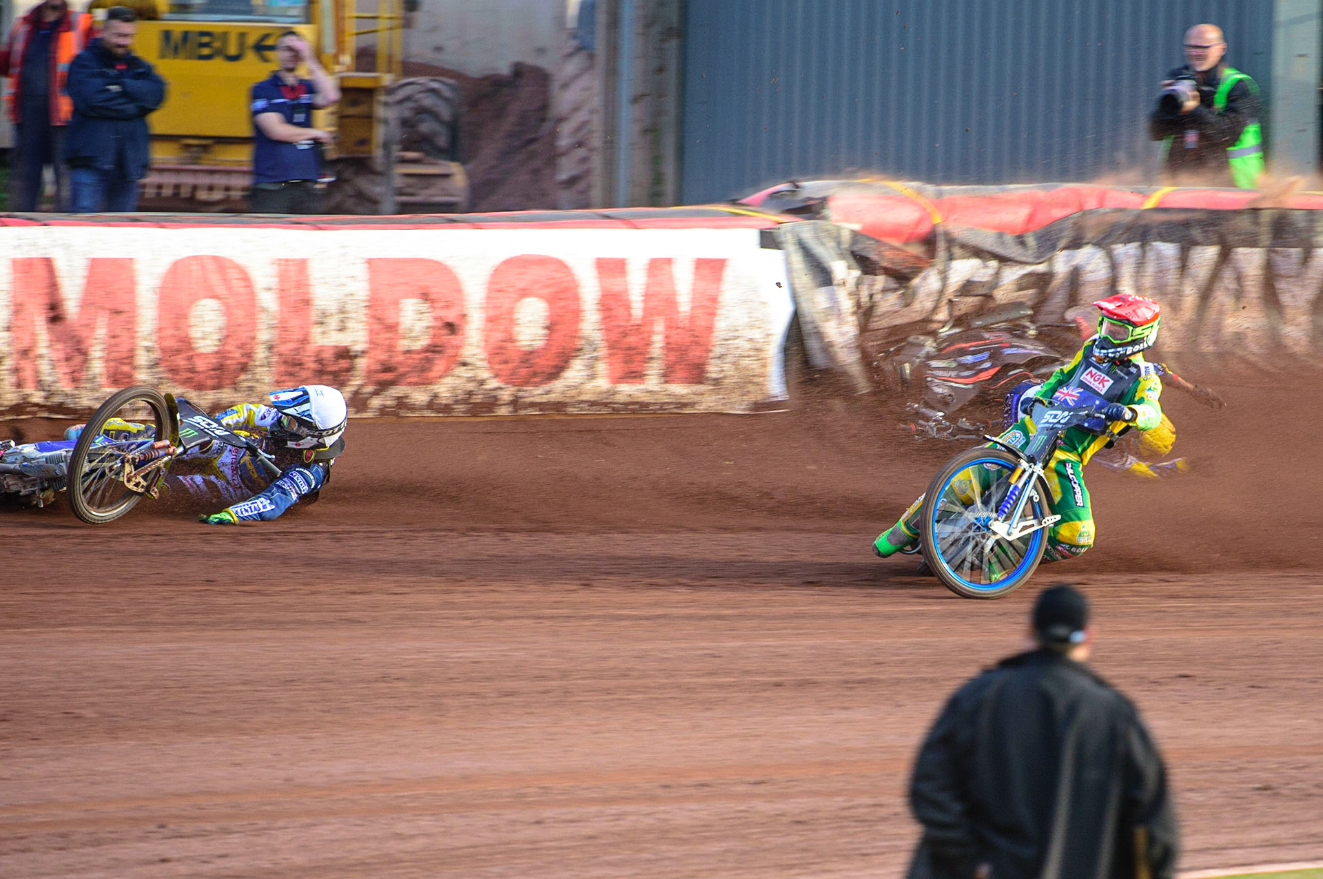 MANCHESTER, UK. OCT 16TH Pontus Aspgren of Sweden (White) slides off as Jacob Thorsell of Sweden hits the airfence during the Monster Energy FIM Speedway of Nations at the National Speedway Stadium, Manchester on Saturday  16th October 2021. (Credit: Ian Charles | MI News)