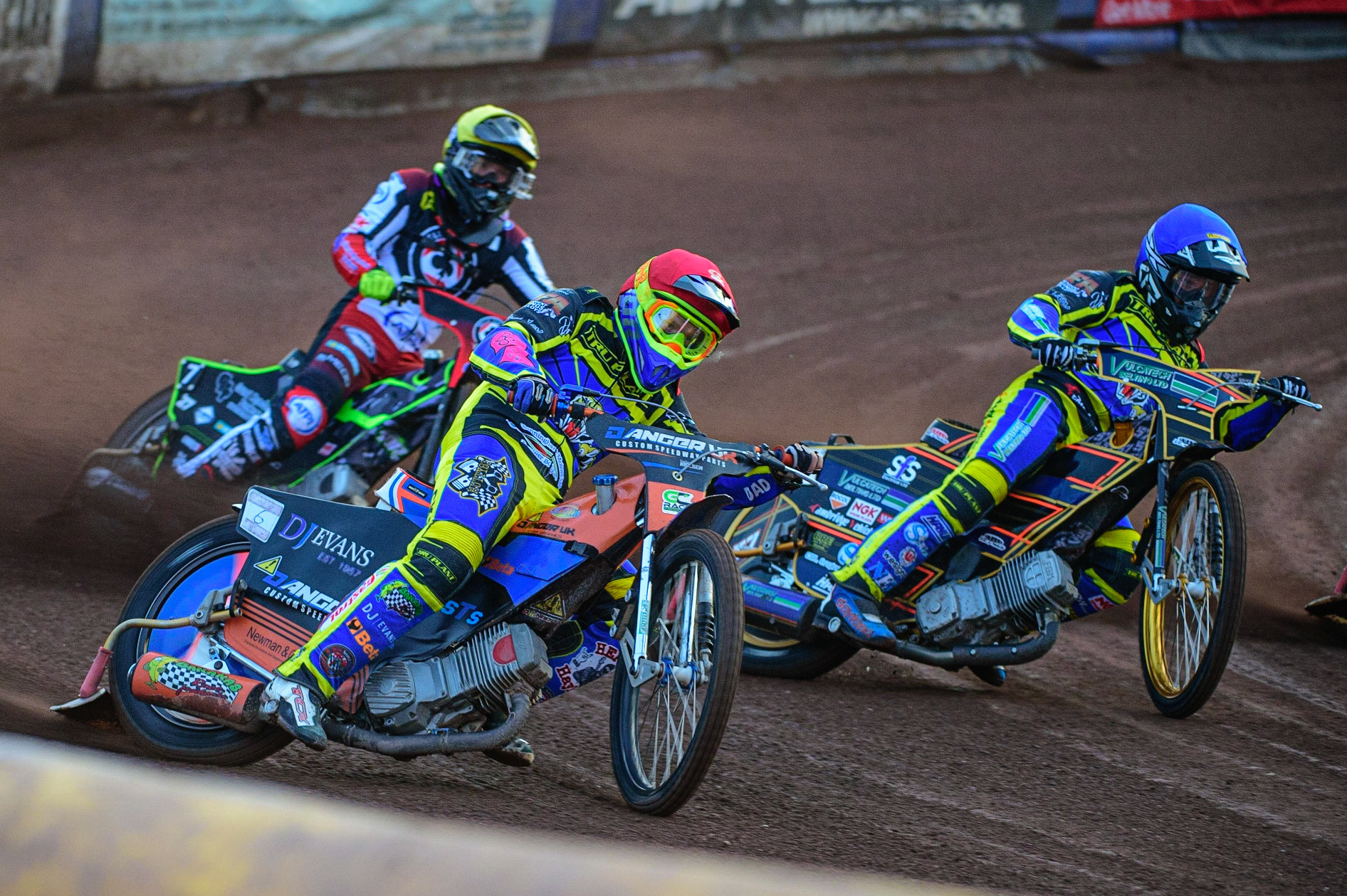 SHEFFIELD, UK. APR 14TH  Stefan Nielsen   (Red) and Connor Mountain   (Blue) leads Tom Brennan  (Yellow)  during the SGB Premiership League Cup match between Sheffield Tigers and Belle Vue Aces at Owlerton Stadium, Sheffield on Thursday 14th April 2022. (Credit: Ian Charles | MI News)
