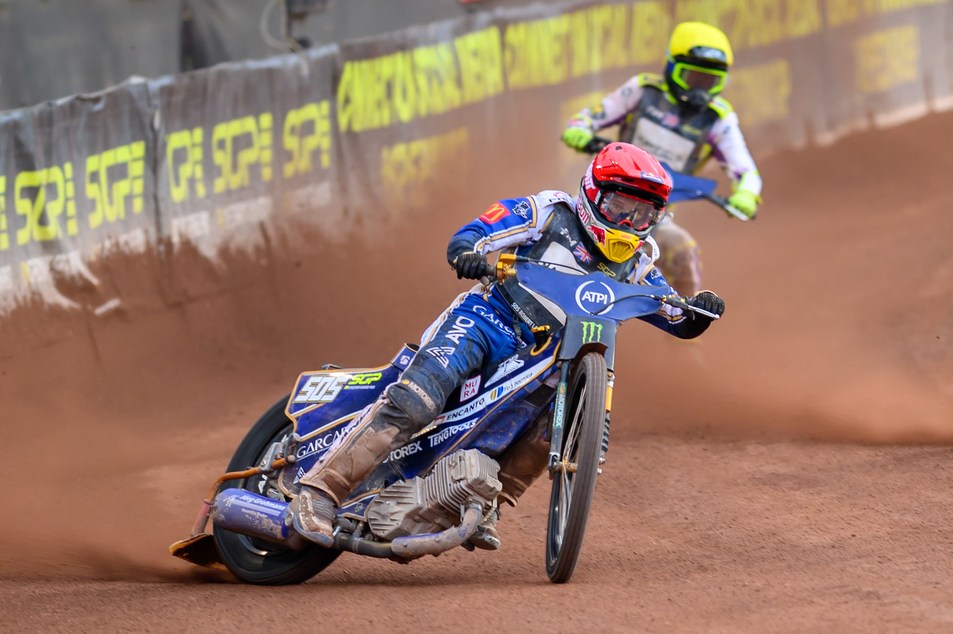 Robert Lambert (505) of Great Britain in Red leading Wild Card Tom Brennan (16) of Great Britain in Yellow during the ATPI  FIM Speedway GP of Manchester at the National Speedway Stadium, Manchester on Friday 5th June 2026. (Photo: Ian Charles | MI News)