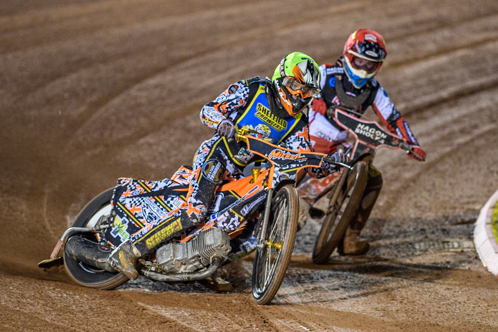 Sheffield Cubs' Mickie Simpson in Yellow leading Belle Vue Colts' Sam Hagon in Red during the WSRA National Development League match between Belle Vue Colts and Sheffield Tiger Cubs at the National Speedway Stadium, Manchester on Monday 7th October 2024. (Photo: Ian Charles | MI News)