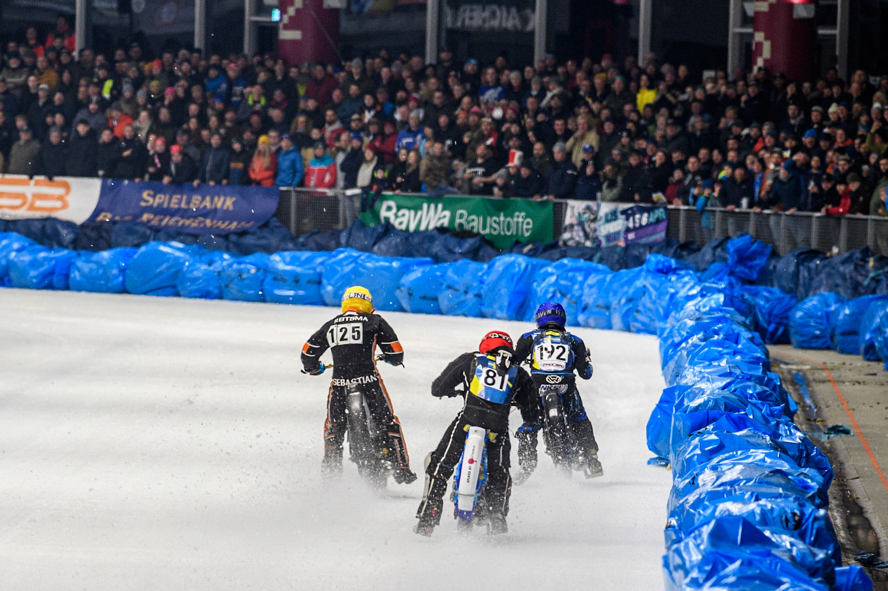 Jimmy Olsén (81) of Sweden in Red chases Sebastian Reitsma (125) of The Netherlands in Yellow and Niclas Svensson (192) of Sweden in Blue during the Ice Speedway Gladiators World Championship Final 1 at Max-Aicher-Arena, Inzell on Saturday 15th March 2025. (Photo: Ian Charles | MI News)