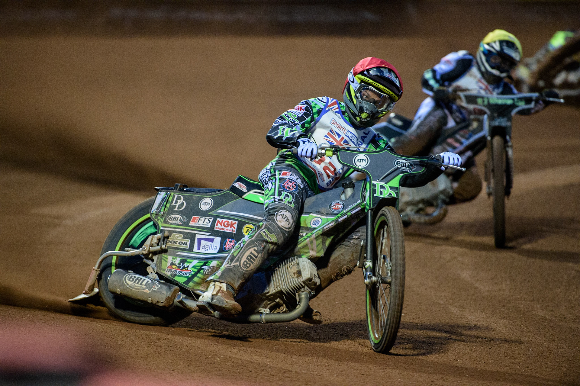 MANCHESTER, UK. AUGUST 16TH   Charles Wright  (Red) leads  Danny King (Yellow) during the Sports Insure British Speedway Finals at the National Speedway Stadium, Manchester on Monday 16th August 2021. (Credit: Ian Charles | MI News)