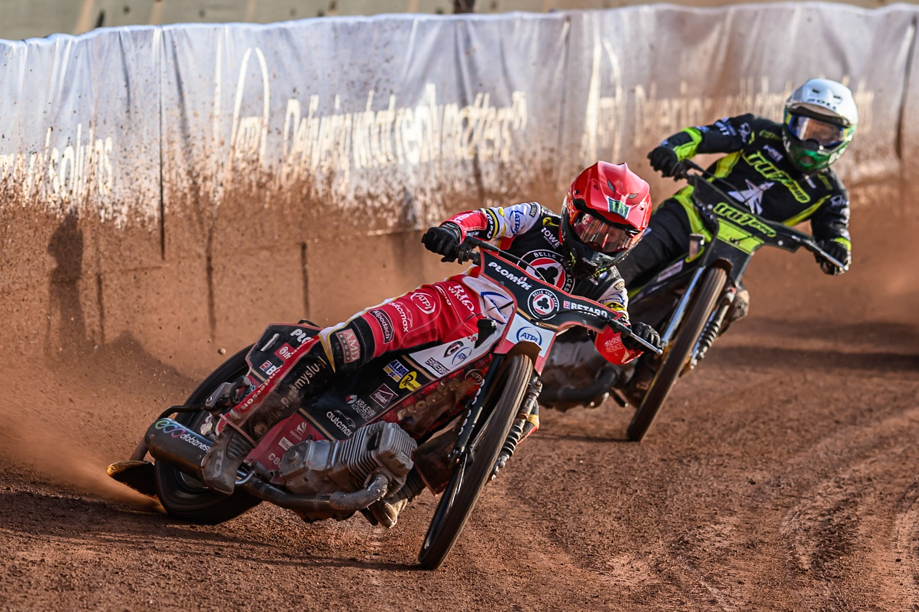 Belle Vue Aces' Dan Bewley  in Red leading Ipswich Witches' Jason Doyle  in White during the Rowe Motor Oil Premiership match between Belle Vue Aces and Ipswich Witches at the National Speedway Stadium, Manchester on Monday 30th June 2025. (Photo: Ian Charles | MI News)