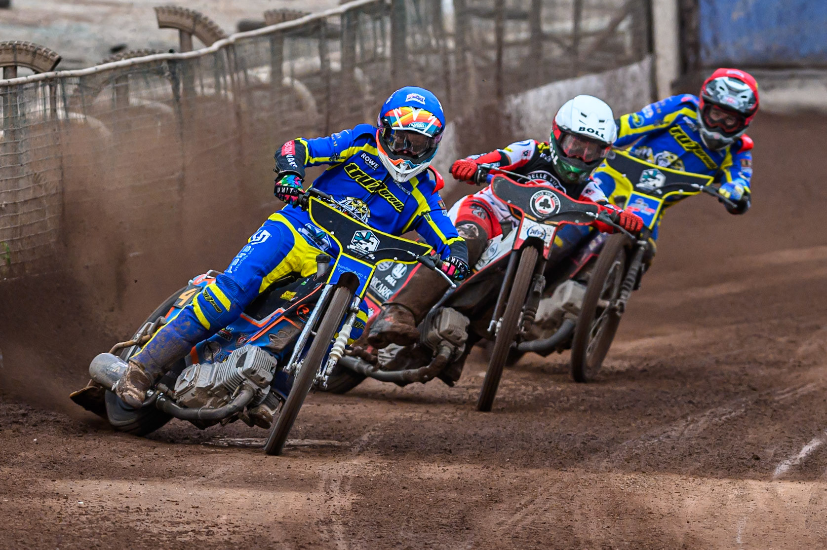 Nick Morris of Sheffield Tigers  in Blue leading Brady Kurtz of Belle Vue Aces   in White and Josh Pickering of Sheffield Tigers  in Red during the Rowe Motor Oil Premiership match between Sheffield Tigers and Belle Vue Aces at Owlerton Stadium, Sheffield on Monday 11th August 2025. (Photo: Ian Charles | MI News)