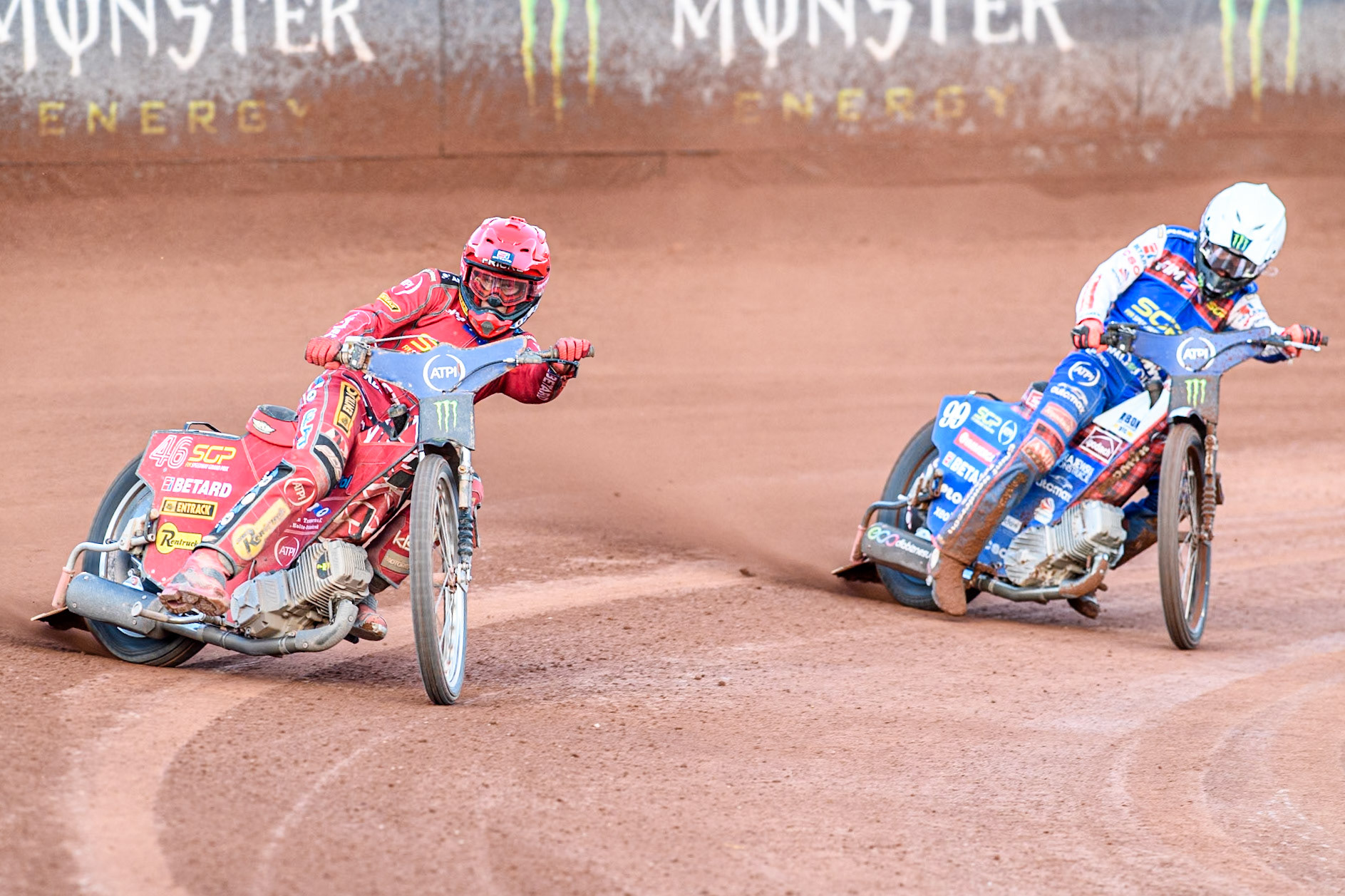 Max Fricke (46) of Australia in Red leading Dan Bewley (99) of Great Britain in White during the ATPI FIM Speedway Grand Prix Round 5 at the National Speedway Stadium, Manchester, on Saturday 14th June 2025. (Photo: Ian Charles | MI News)