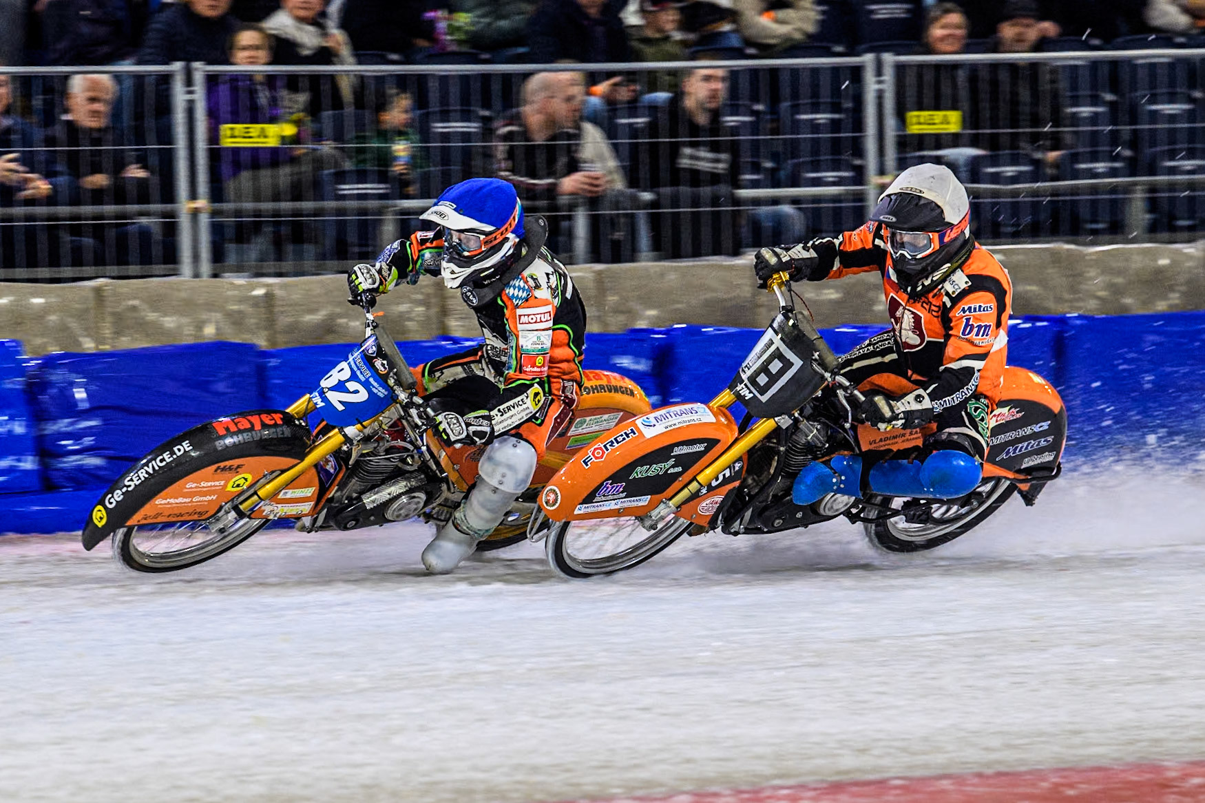 Germany's Markus Jell (82) in Blue rides outside Reserve Czech Republic's Lukáš Hutla (18) in White during the FIM Ice Speedway Gladiators World Championship Final 3 at Ice Rink Thialf, Heerenveen on Saturday 6th April 2024. (Photo: Ian Charles | MI News)