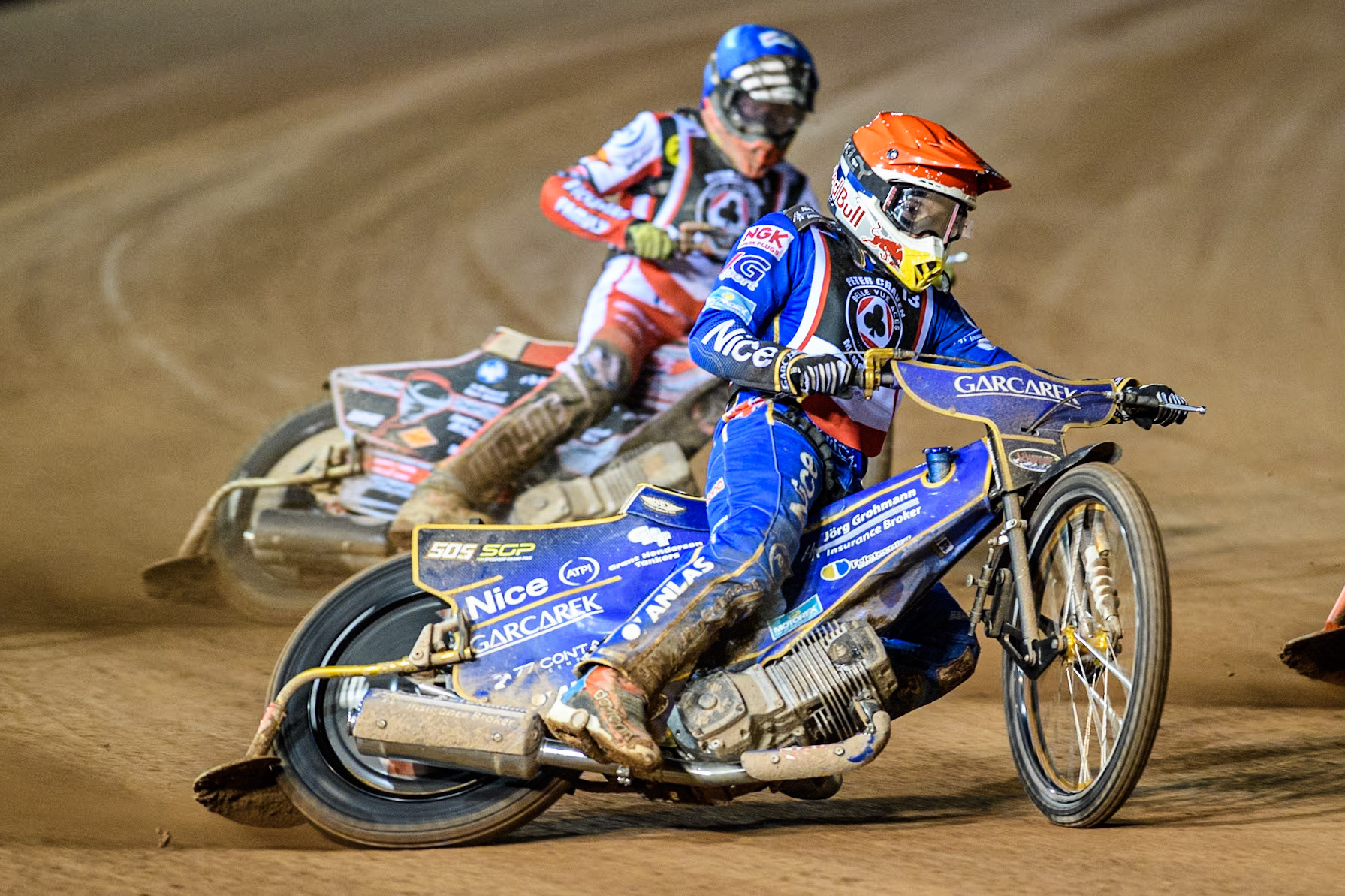 England's Robert Lambert (Red) leads  England's Connor Bailey (Blue) during the Peter Craven Memorial Trophy meeting at the National Speedway Stadium, Manchester on Monday 18th March 2024. (Photo: Ian Charles | MI News)
