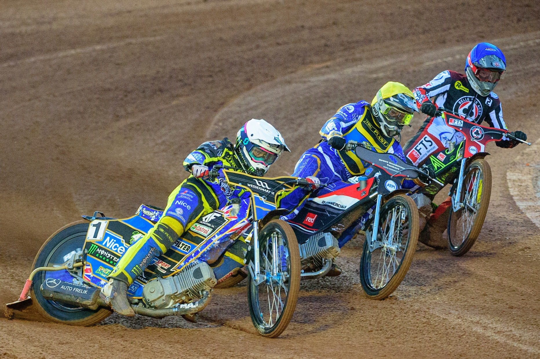 MANCHESTER, UK.  MAR 28TH. Jack Holder of Sheffield (White) leads Richie Worrall of Sheffield  (Yellow), and Jye Etheridge of Belle Vue  (Blue)  during the SGB Premiership League Cup match between Belle Vue Aces and Sheffield Tigers at the National Speedway Stadium, Manchester on Monday 28th March 2022. (Credit: Ian Charles | MI News)