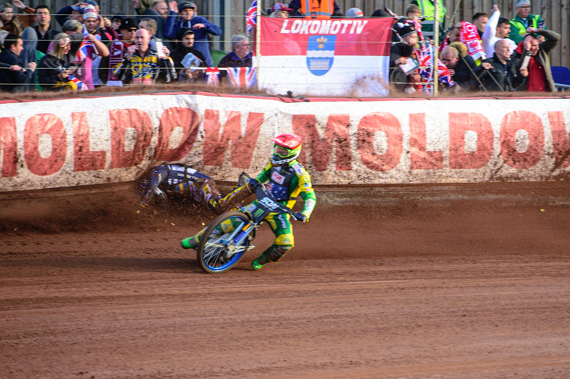 MANCHESTER, UK. OCT 16TH Pontus Aspgren of Sweden (White) slides off as Jacob Thorsell of Sweden hits the airfence during the Monster Energy FIM Speedway of Nations at the National Speedway Stadium, Manchester on Saturday  16th October 2021. (Credit: Ian Charles | MI News)