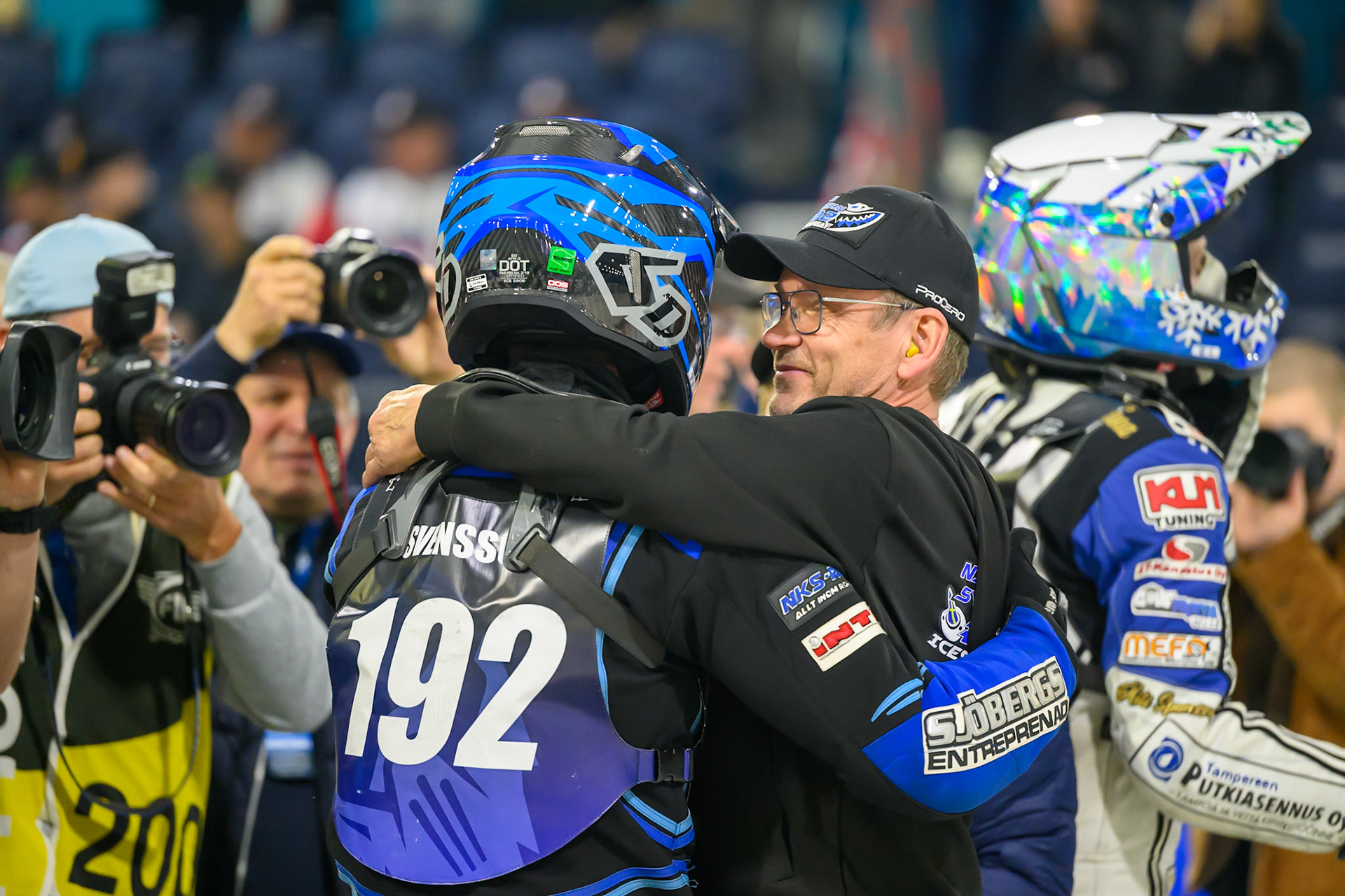 Niclas Svensson (192) of Sweden  gets a hug from his father Stefan during the FIM Ice Speedway Gladiators World Championship Final 3 at Ice Rink Thialf, Heerenveen on Saturday 11th April 2026. (Photo: Ian Charles | MI News)