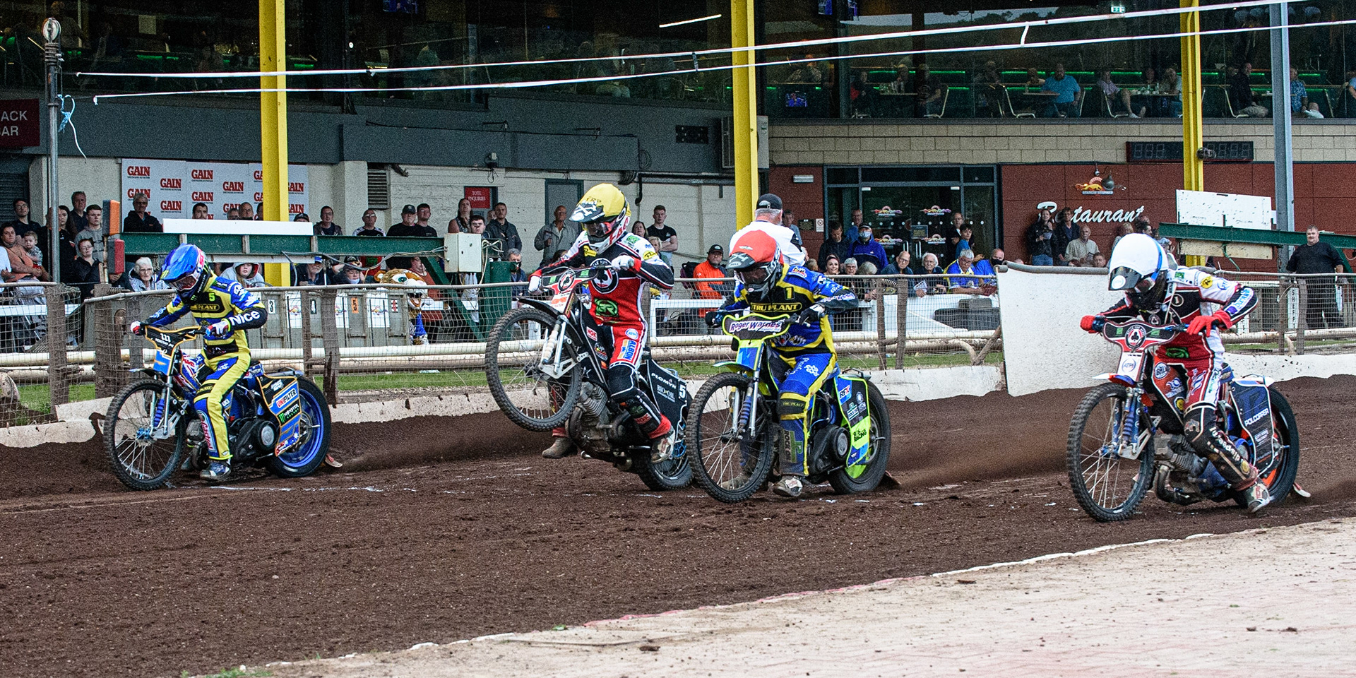 SHEFFIELD, UK. JULY 1ST     Heat 13 start: (l-r) Jack Holder  (Blue), Dan Bewley  (Yellow) Troy Batchelor  (Red) and Brady Kurtz  (White) during the SGB Premiership match between Sheffield Tigers and Belle Vue Aces at Owlerton Stadium, Sheffield on Thursday 1st July 2021. (Credit: Ian Charles | MI News)