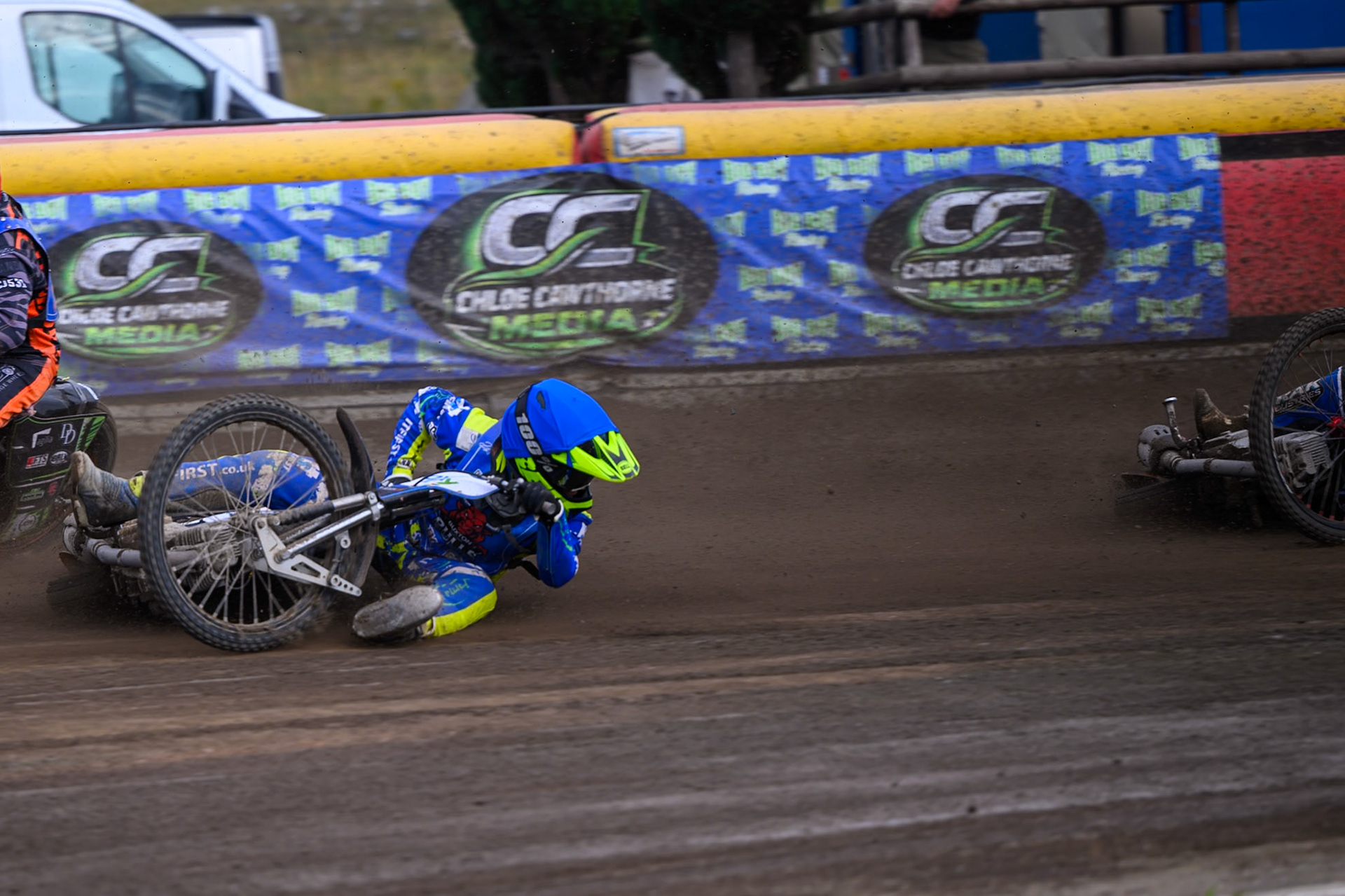 Will Boraston of Buxton Bulls in Yellow falls in the path of Ollie Binns of Kings Lynn Young Stars during the WSRA National Development League match between Buxton Bulls and King's Lynn Young Stars at Hi-Edge Speedway, Buxton on Sunday 9th August 2026. (Photo: Ian Charles | MI News)