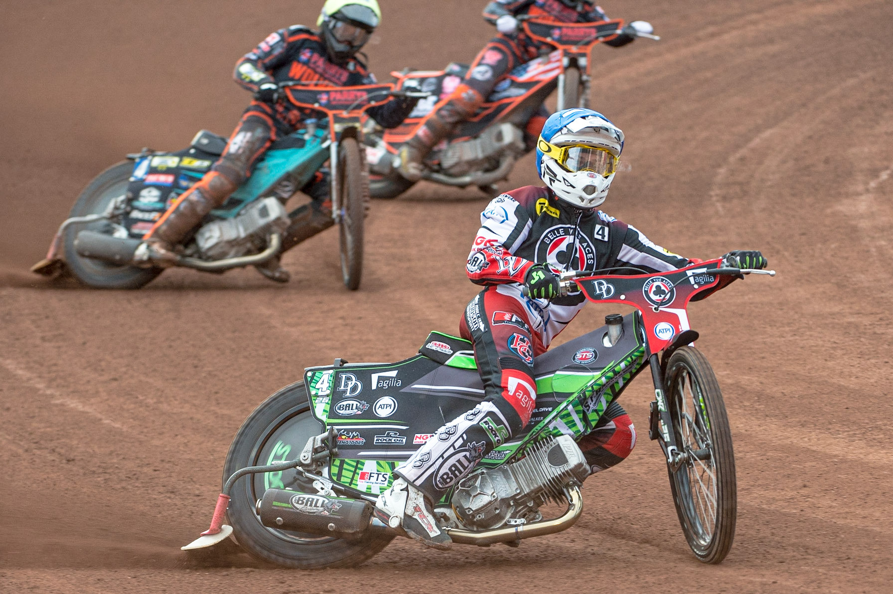 MANCHESTER, UK. JUN 13TH Charles Wright  (Blue) leads Luke Becker  (White) and Ryan Douglas  (Yellow) during the SGB Premiership match between Belle Vue Aces and WolverhamptoWolves at the National Speedway Stadium, Manchester on Monday 13th June 2022. (Credit: Ian Charles | MI News)