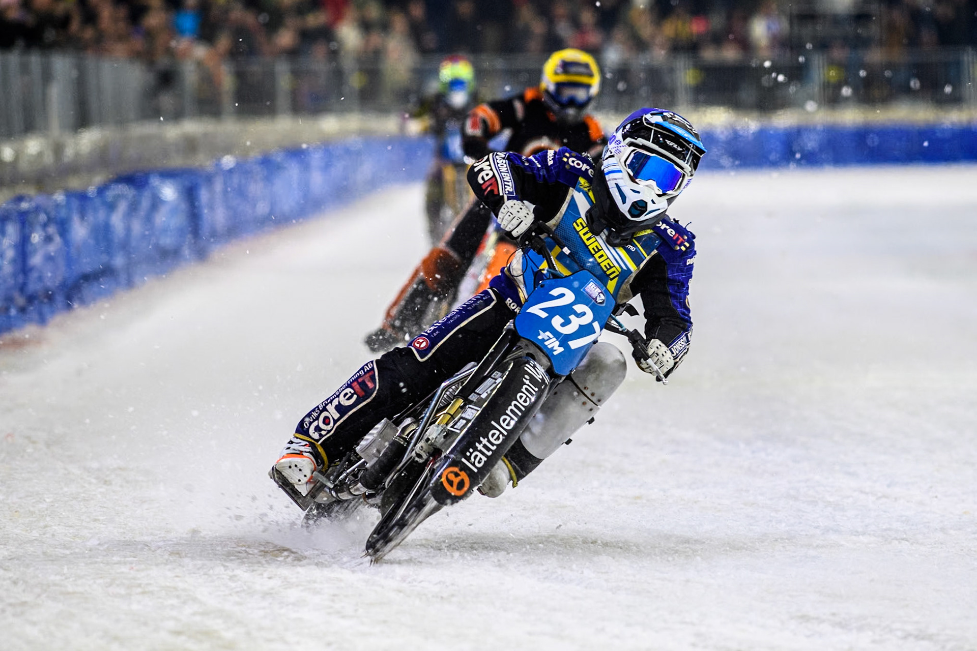 Sweden's Jimmy Hörnell Lidfalk (237) in Blue leading Netherland's Sebastian Reitsma (283) in Yellow and Germany's Maximillian Neidermaier (16) in Red during the FIM Ice Speedway Gladiators World Championship Final 4 at Ice Rink Thialf, Heerenveen on Sunday 7th April 2024. (Photo: Ian Charles | MI News)