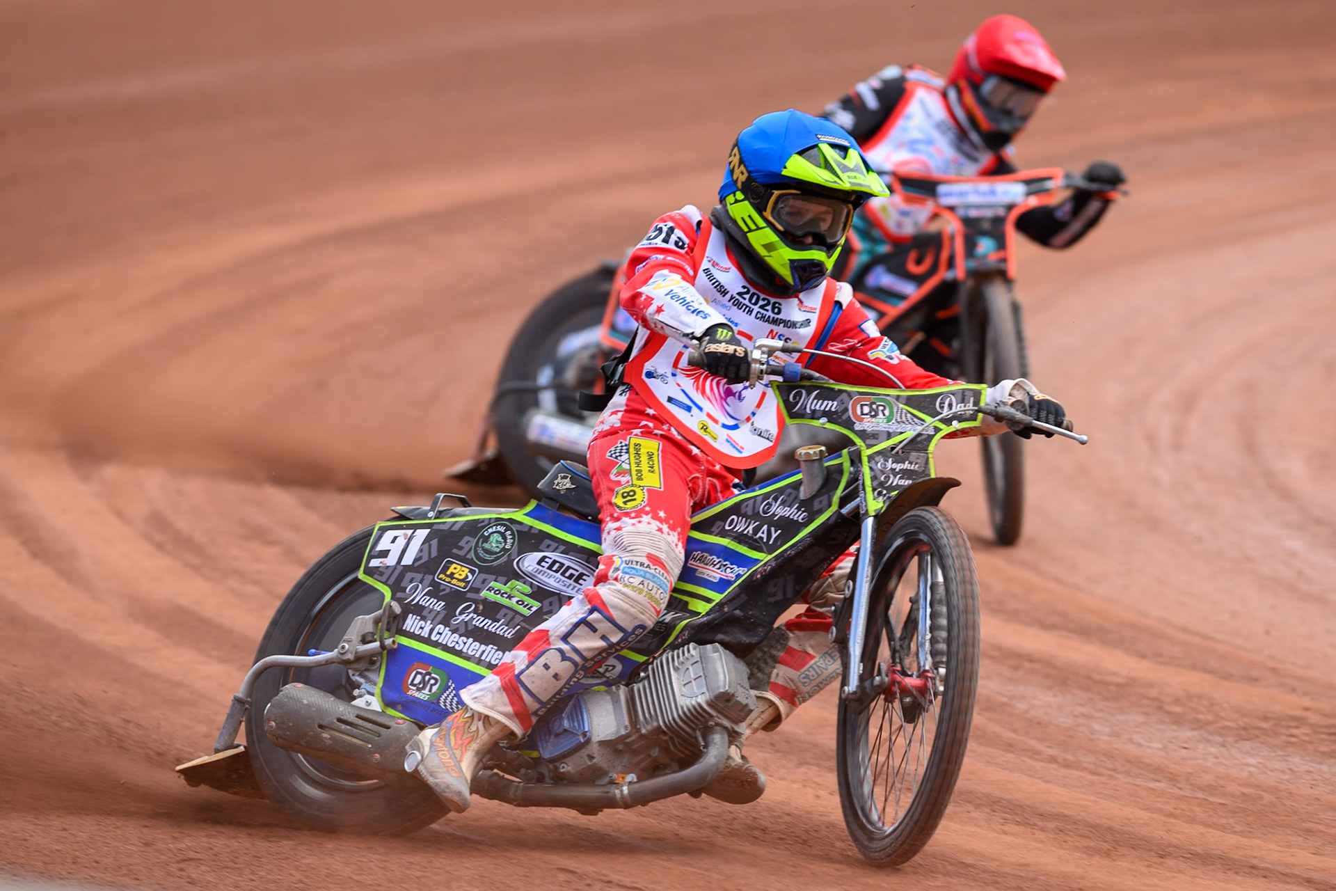 BRITISH YOUTH CHAMPIONSHIP (500cc): Ollie Binns (91) in Blue leading Casper Kluczniak (505) in Red during the British Youth Speedway Championship at the National Speedway Stadium, Manchester on Sunday 10th May 2026. (Photo: Ian Charles | MI News)