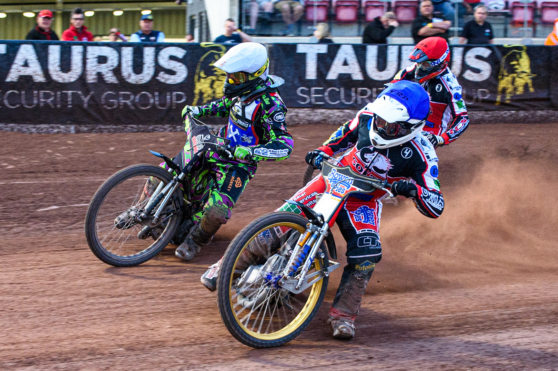 MANCHESTER, UK. JULY 23RD \bv4\ (Blue) inside Richard Andrews  (White) with Jack Parkinson-Blackburn  (Red) behind during the National Development League match between Belle Vue Colts and Eastbourne Seagulls at the National Speedway Stadium, Manchester on Friday 23rd July 2021. (Credit: Ian Charles | MI News)