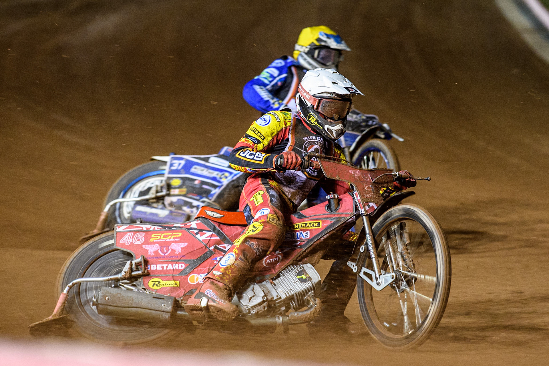 Max Fricke in White rides outside Chris Harris in Yellow during the Peter Craven Memorial Trophy at the National Speedway Stadium, Manchester on Monday 17th March 2025. (Photo: Ian Charles | MI News)