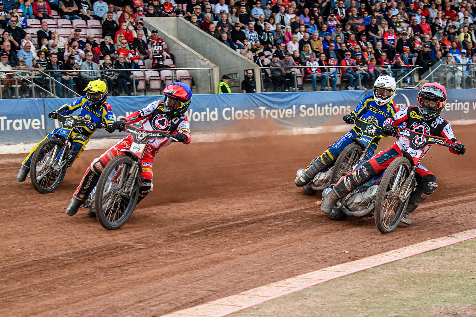 Belle Vue Aces' Dan Bewley in Blue and Belle Vue Aces' Ben Cook in Red leading Sheffield Tigers' Josh Pickering  in White and Sheffield Tigers' Jack Holder  in Yellow  during the Rowe Motor Oil Premiership match between Belle Vue Aces and Sheffield Tigers at the National Speedway Stadium, Manchester on Monday 26th August 2024. (Photo: Ian Charles | MI News)