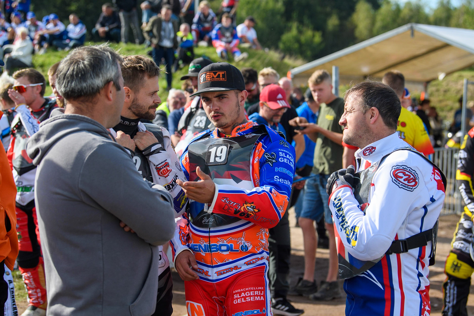 Riders discuss the track after the second practice: (L to R) Hynek Stichauer, Romano Hummel and Chris Harris during the FIM Long Track Of Nations event at the Speed Centre Roden on Sunday 24th September 2023. (Photo: Ian Charles | MI News)